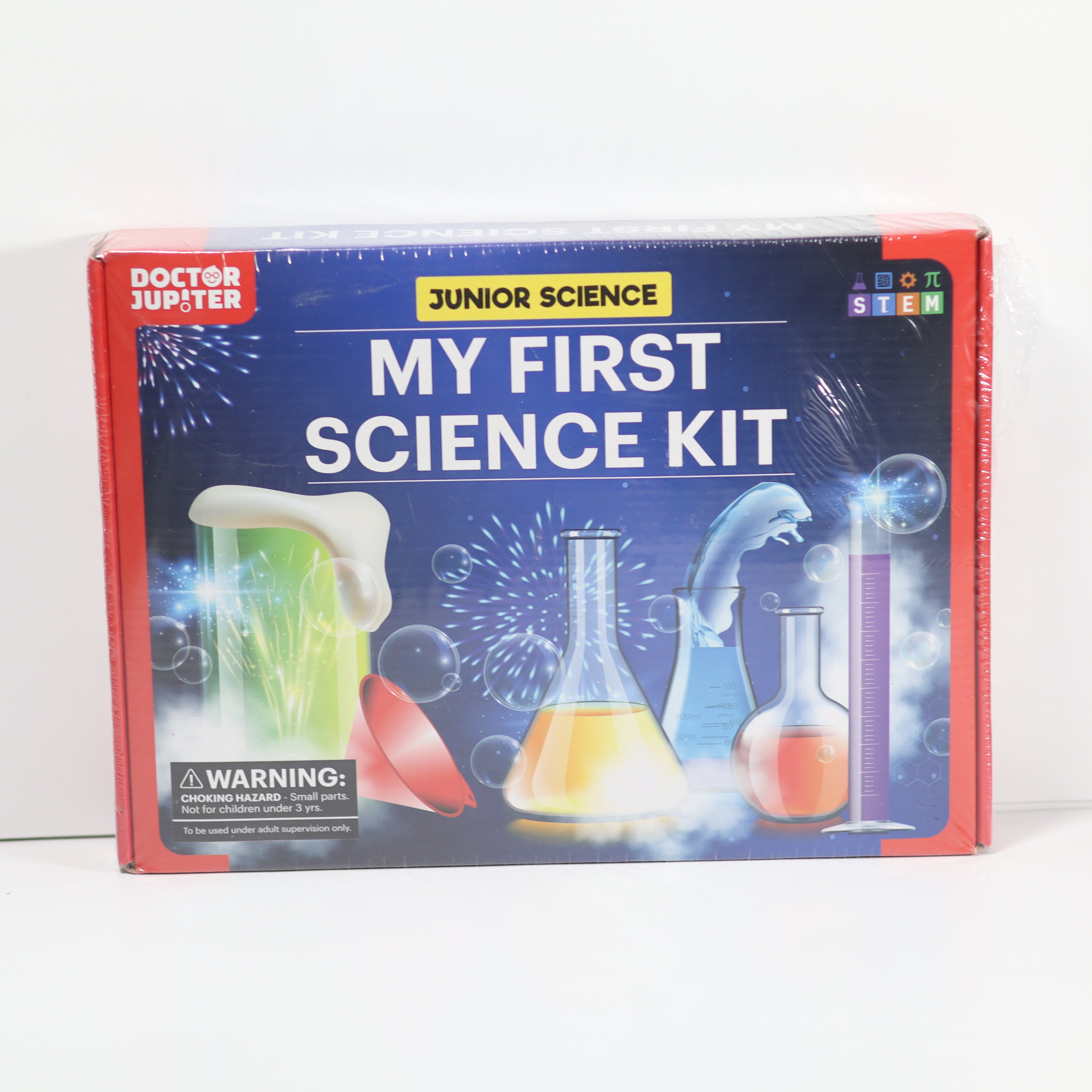 Box of 'My First Science Kit' with colorful lab equipment illustrations on a white background