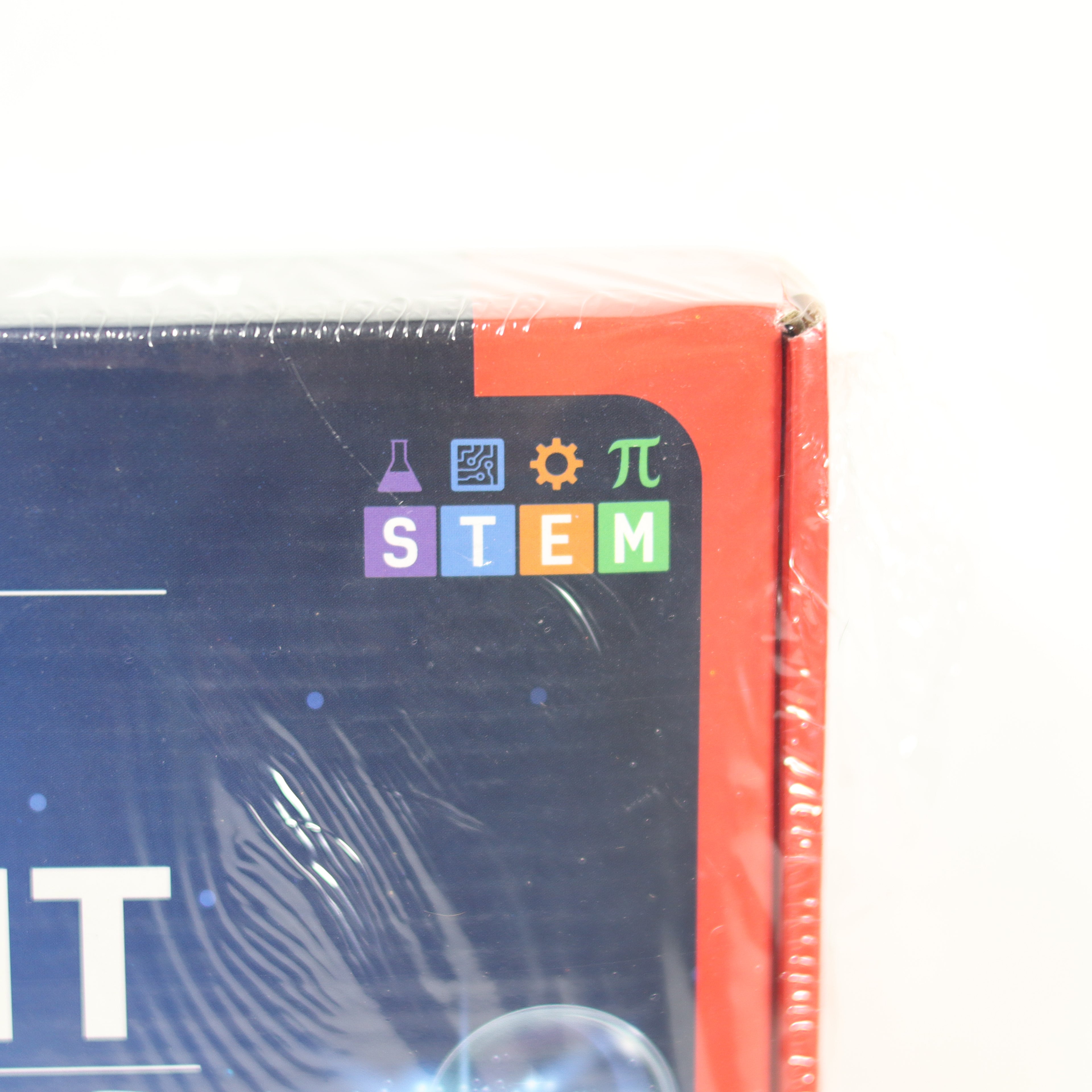 Product packaging with STEM icons on a white background