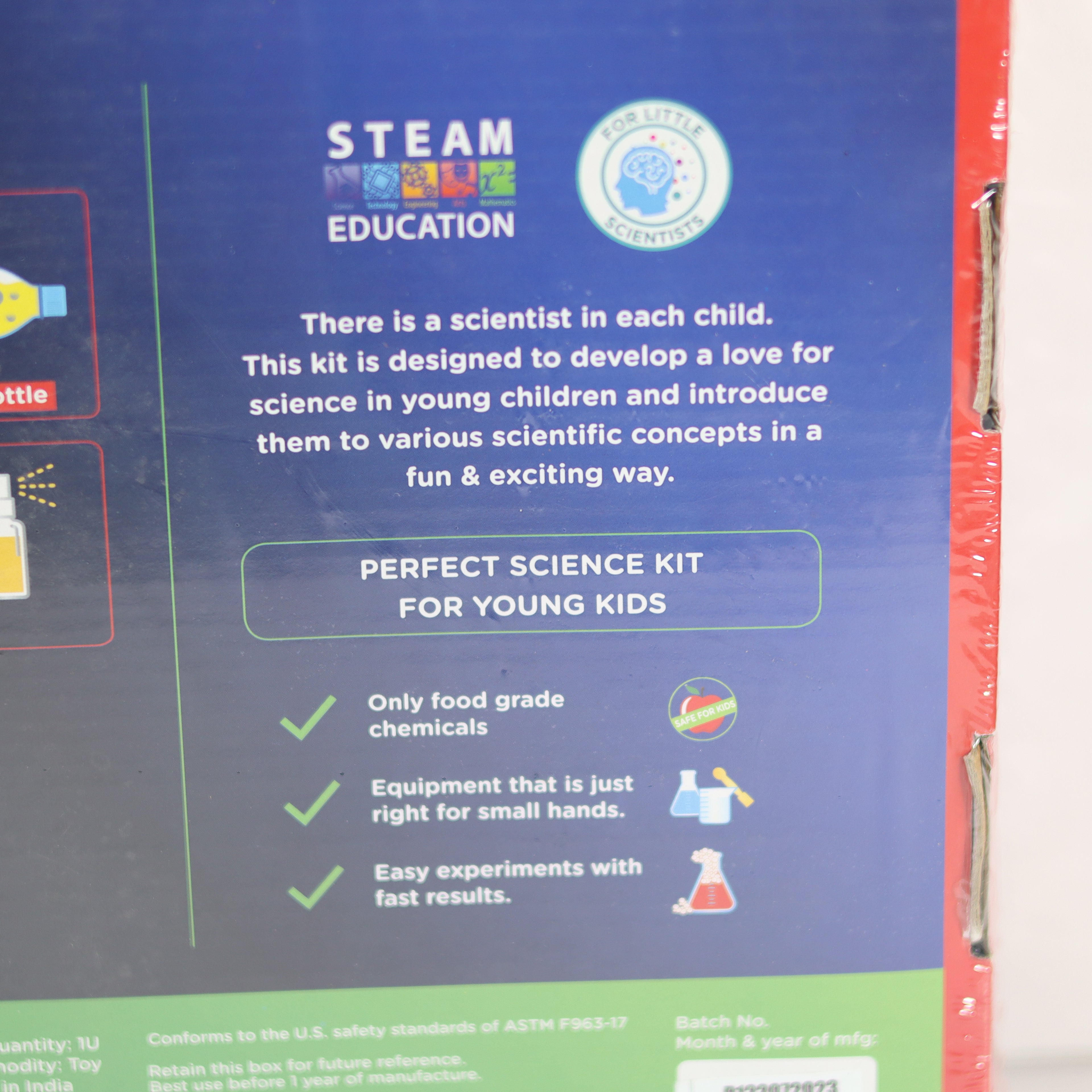 Science education kit packaging with text and logos on a blue background