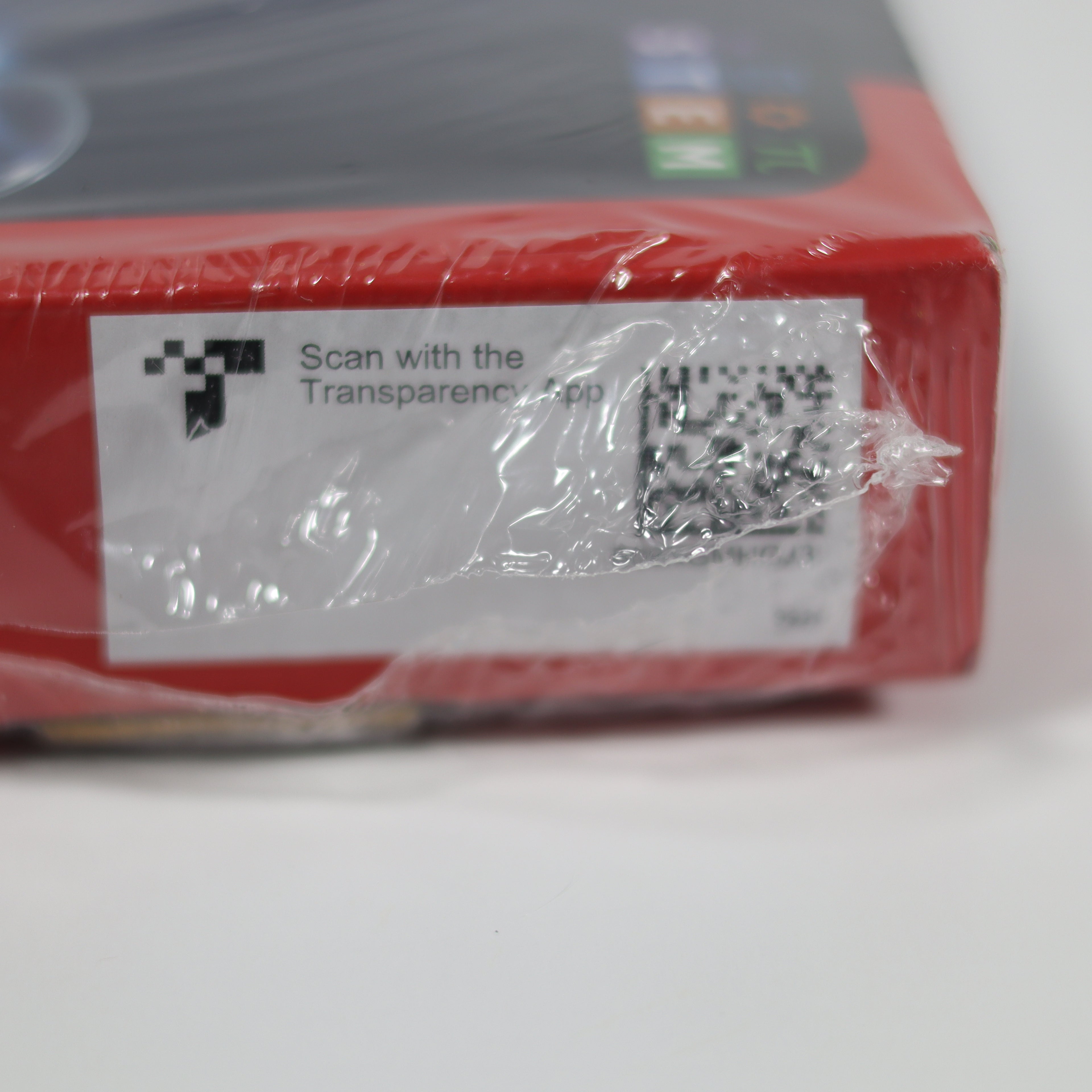 Red box with a QR code label on a white background