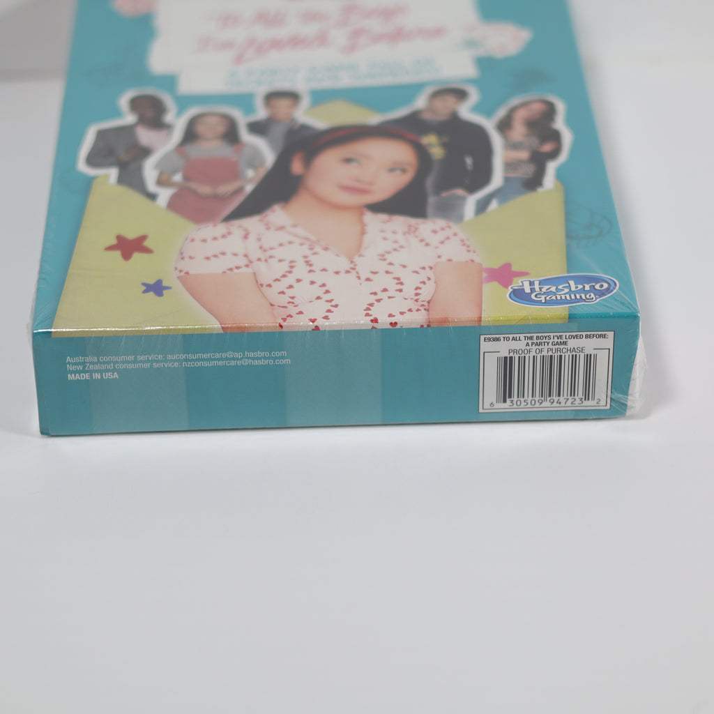 Back of a toy box with a character and Hasbro branding on a white background