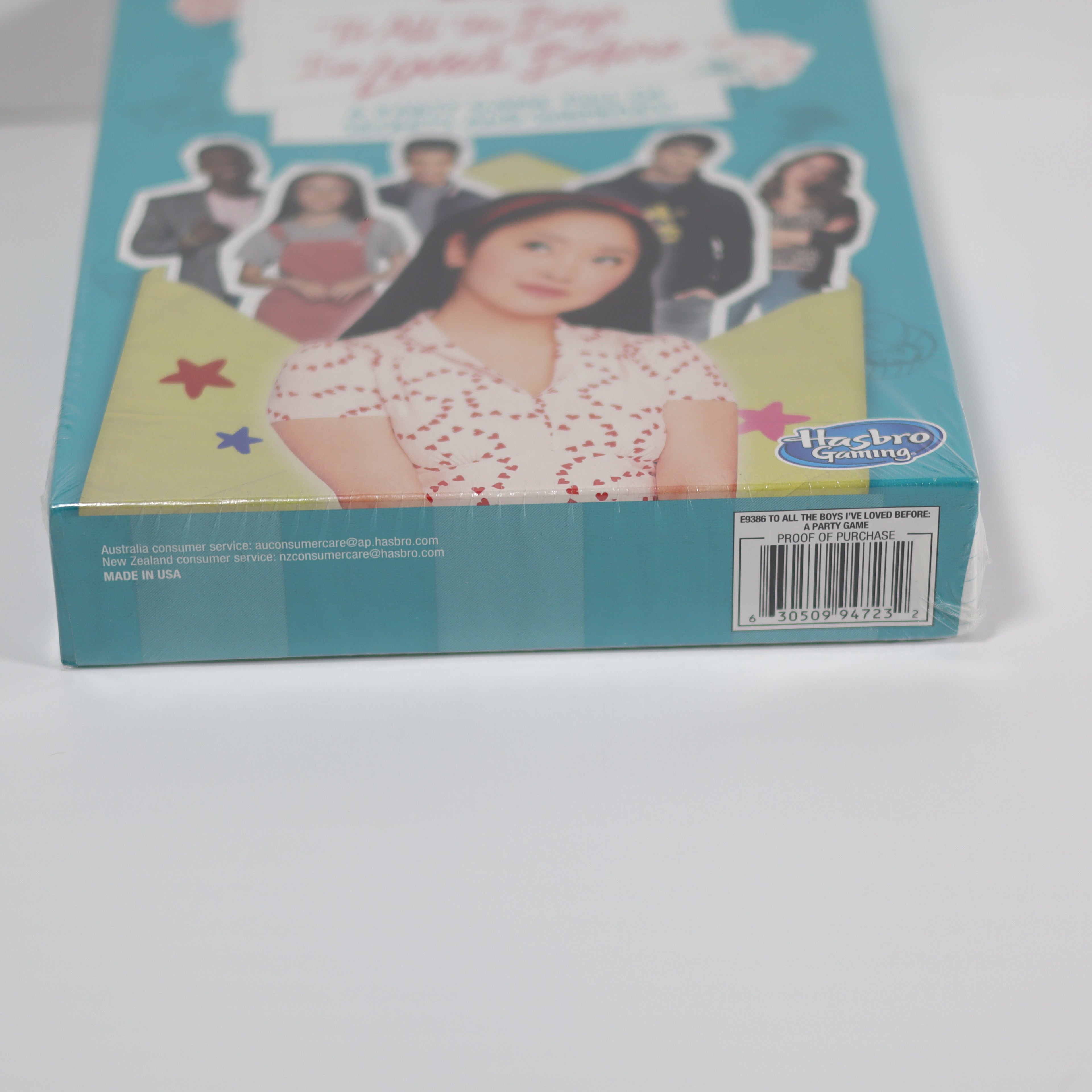 Back of a toy box with a character and Hasbro branding on a white background