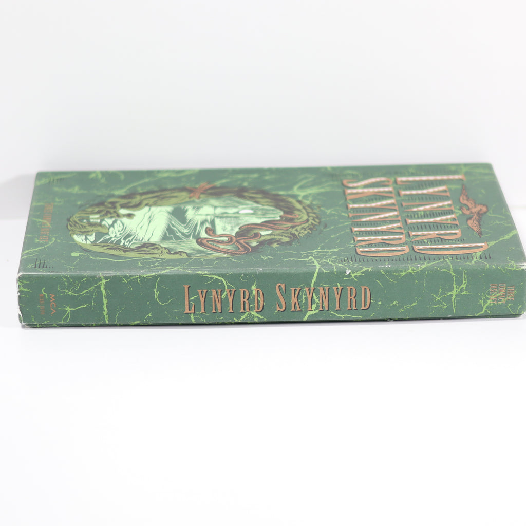 Green book with 'Lynyrd Skynyrd' on a white background