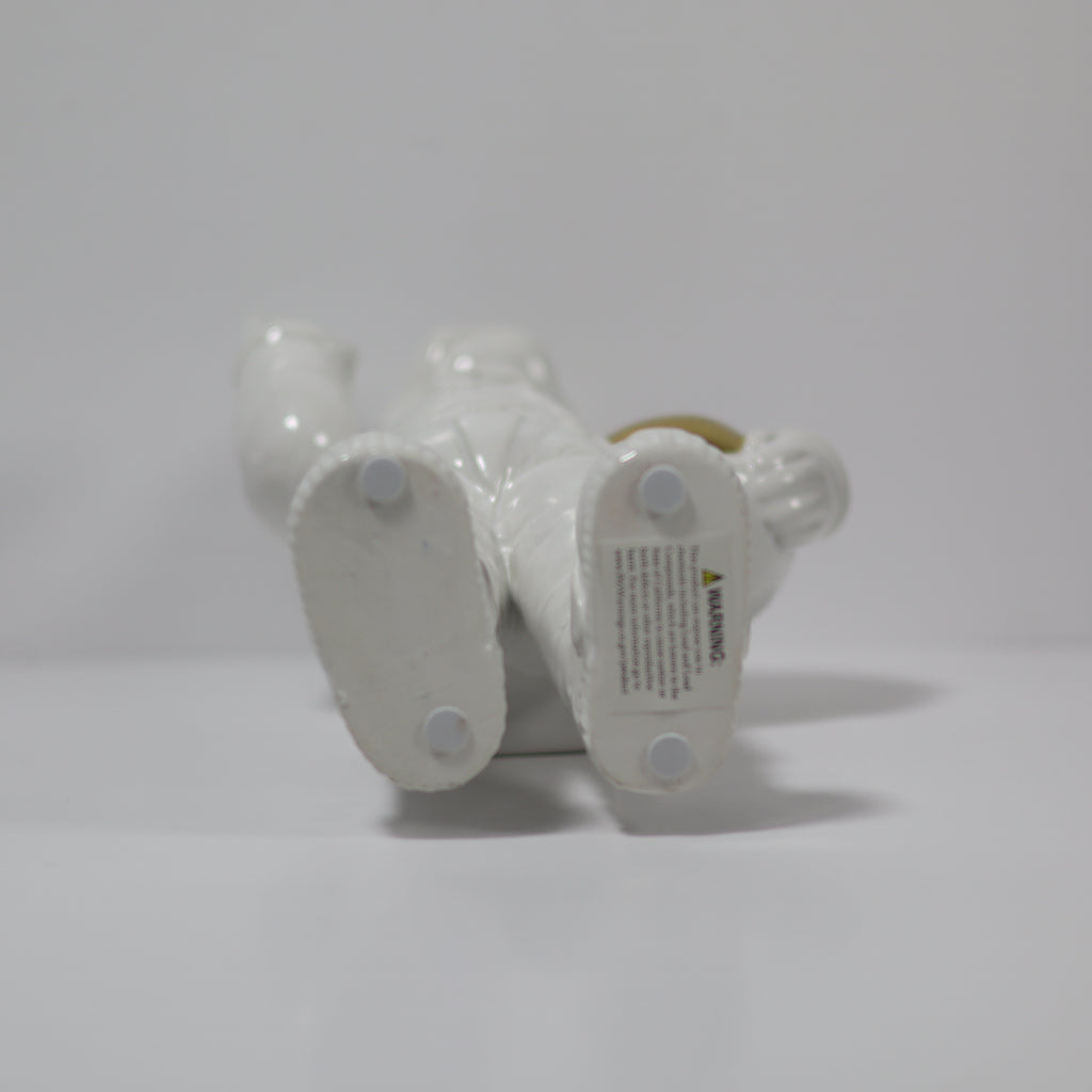 White boots with visible brand name on a light gray background