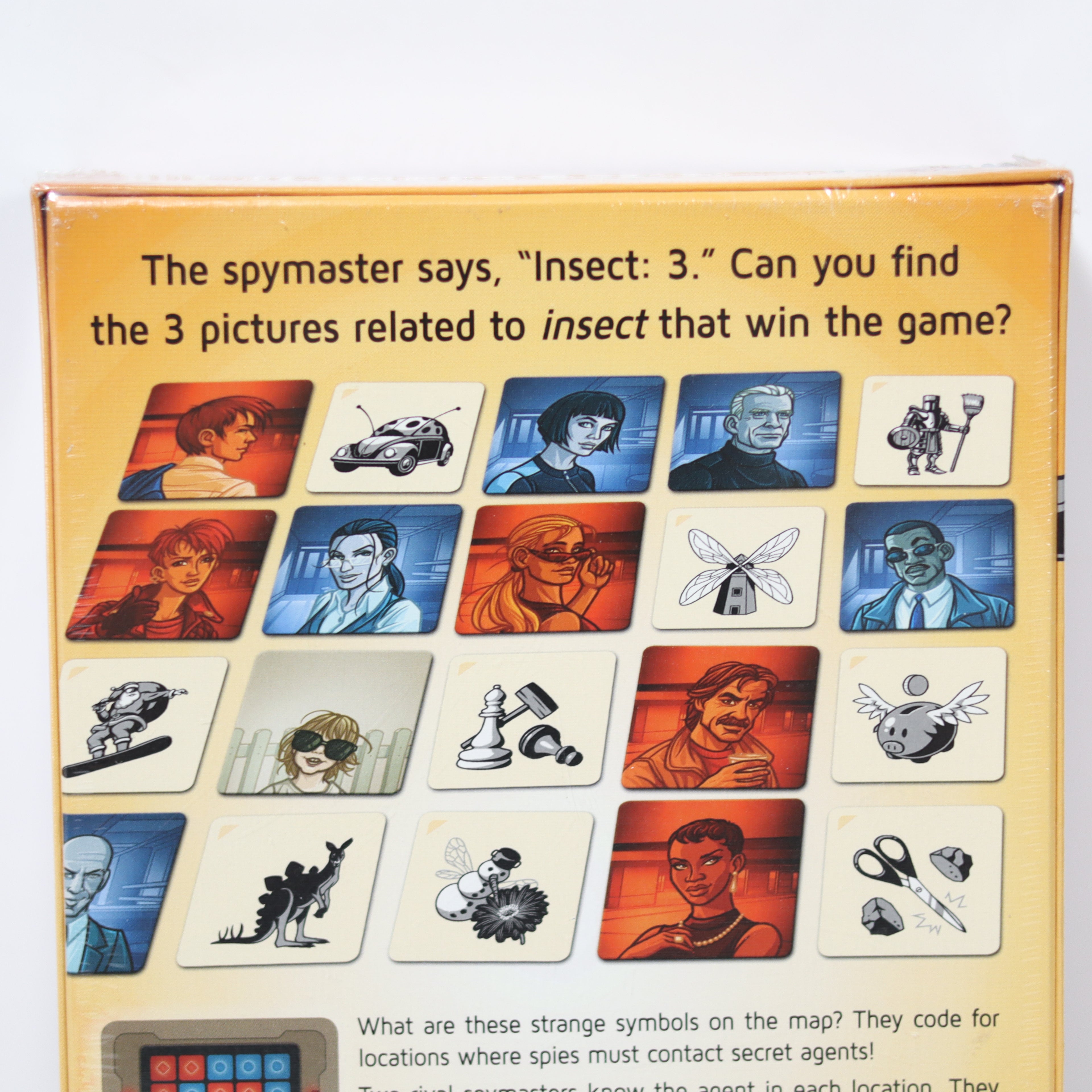 Board game box with images and text related to a spy-themed puzzle