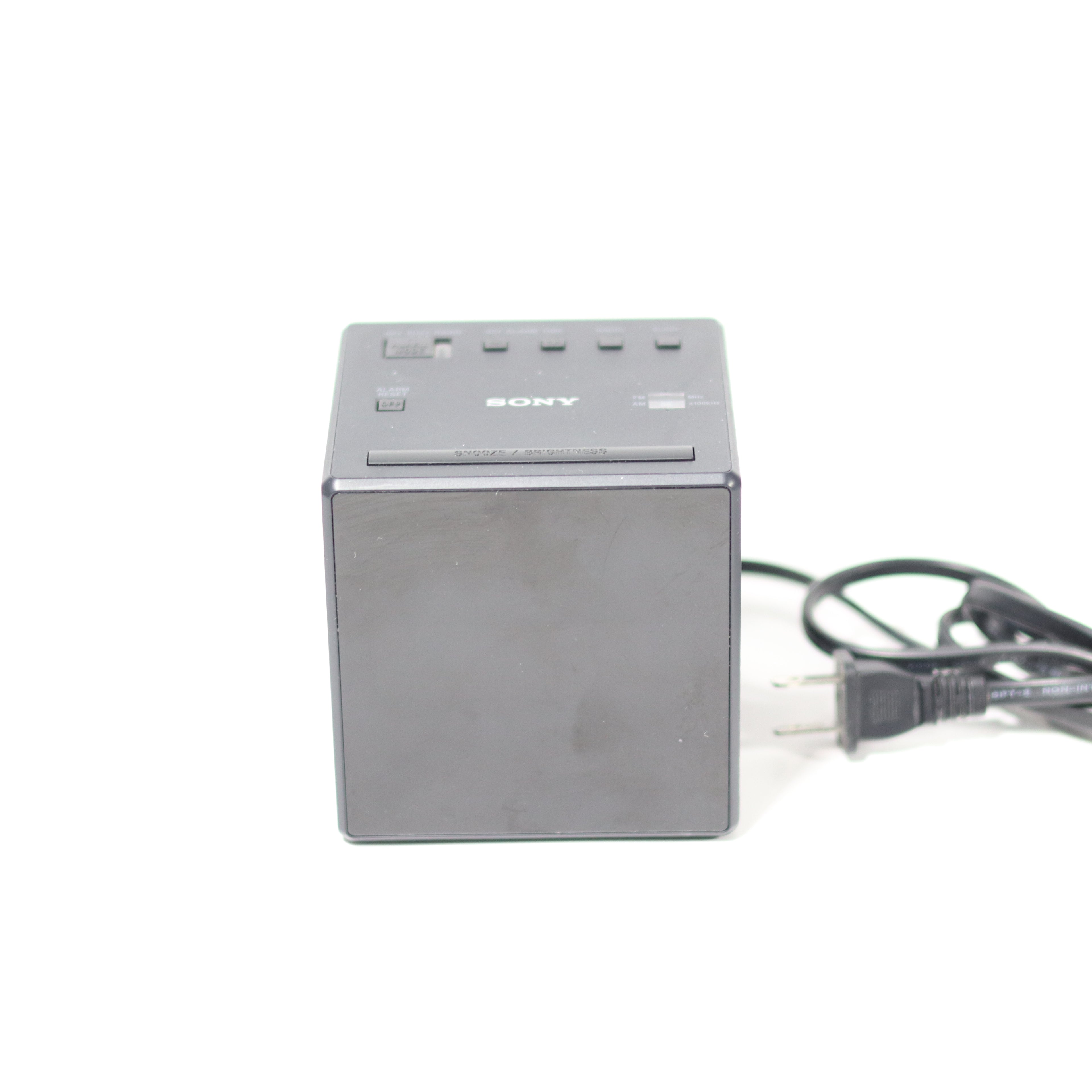 Sony electronic device with power cord on a white background