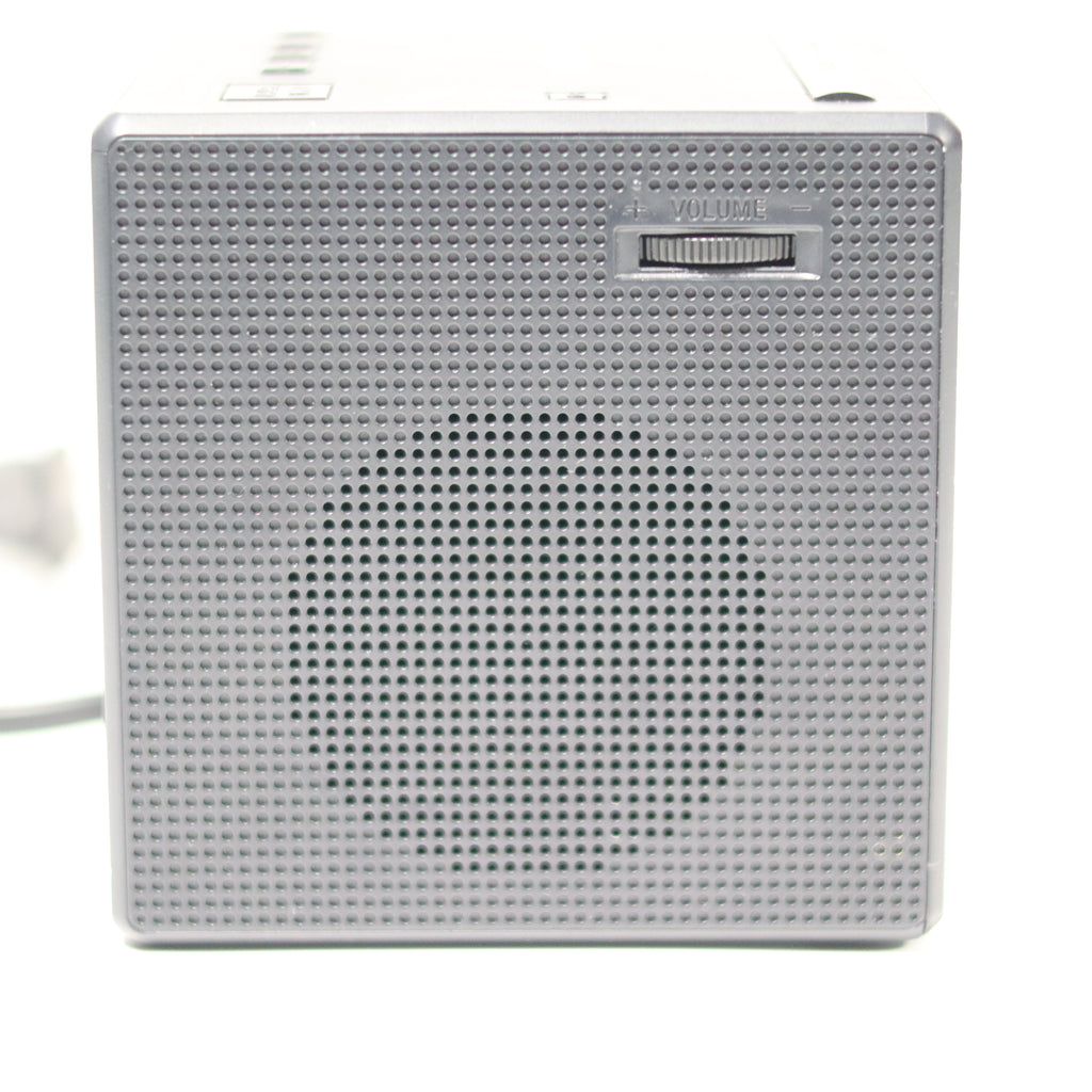 Small electronic device with a grid pattern on a white background