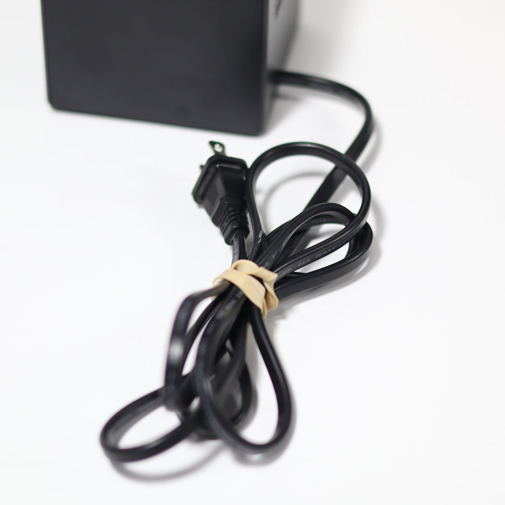 Black power cord with plug on a white background