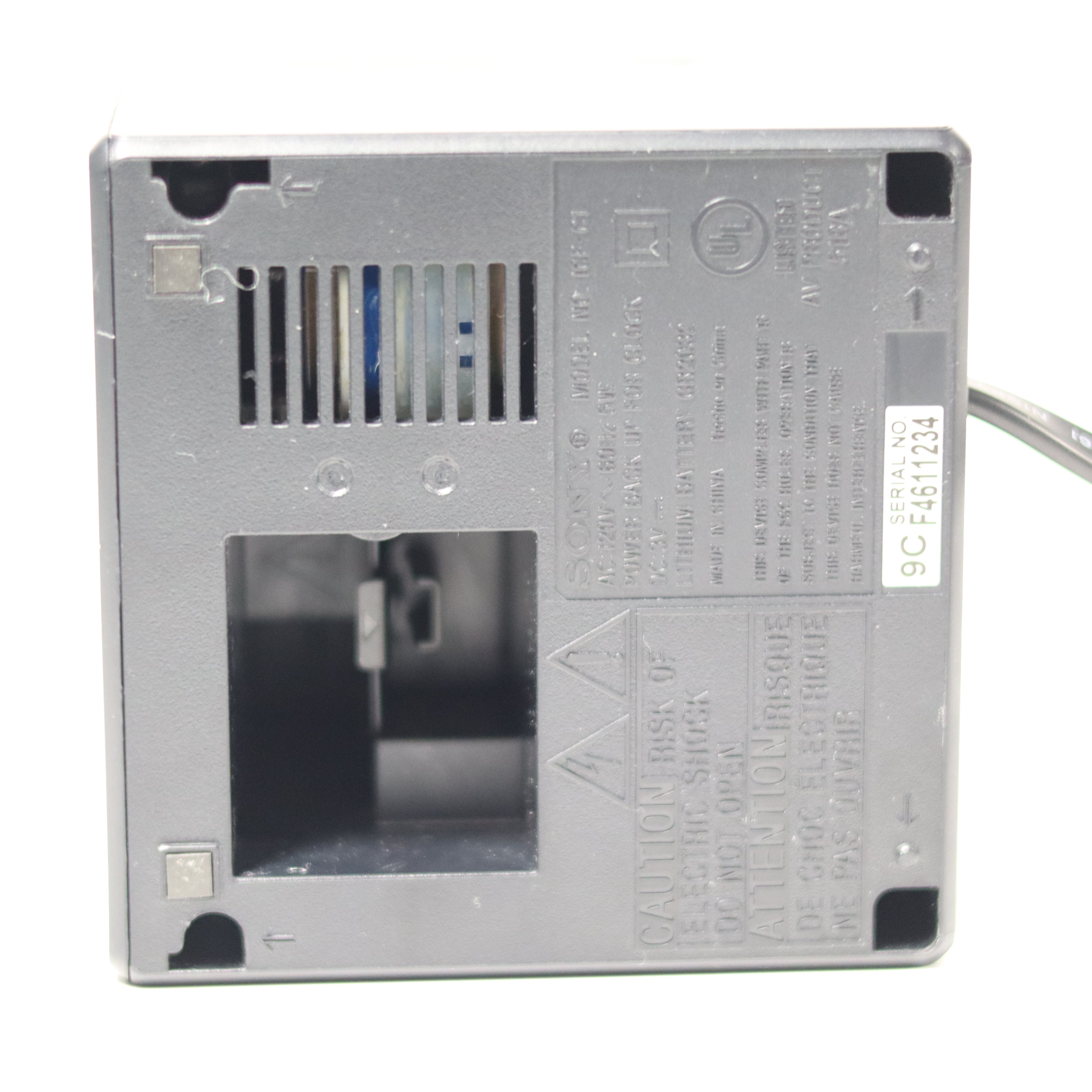 Metallic device with text and cutout on a white background