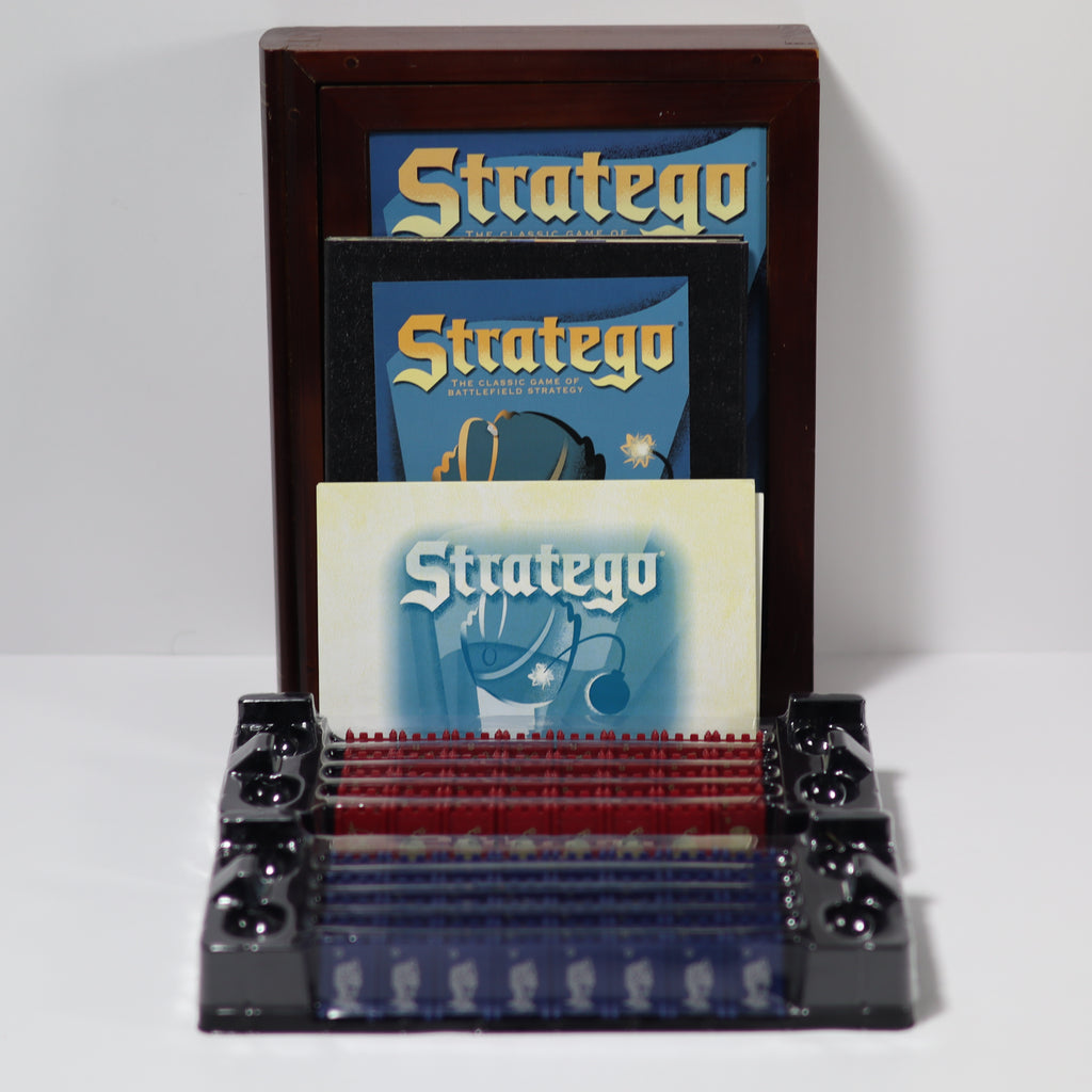 Stratego board game set with cards and pieces on a white background