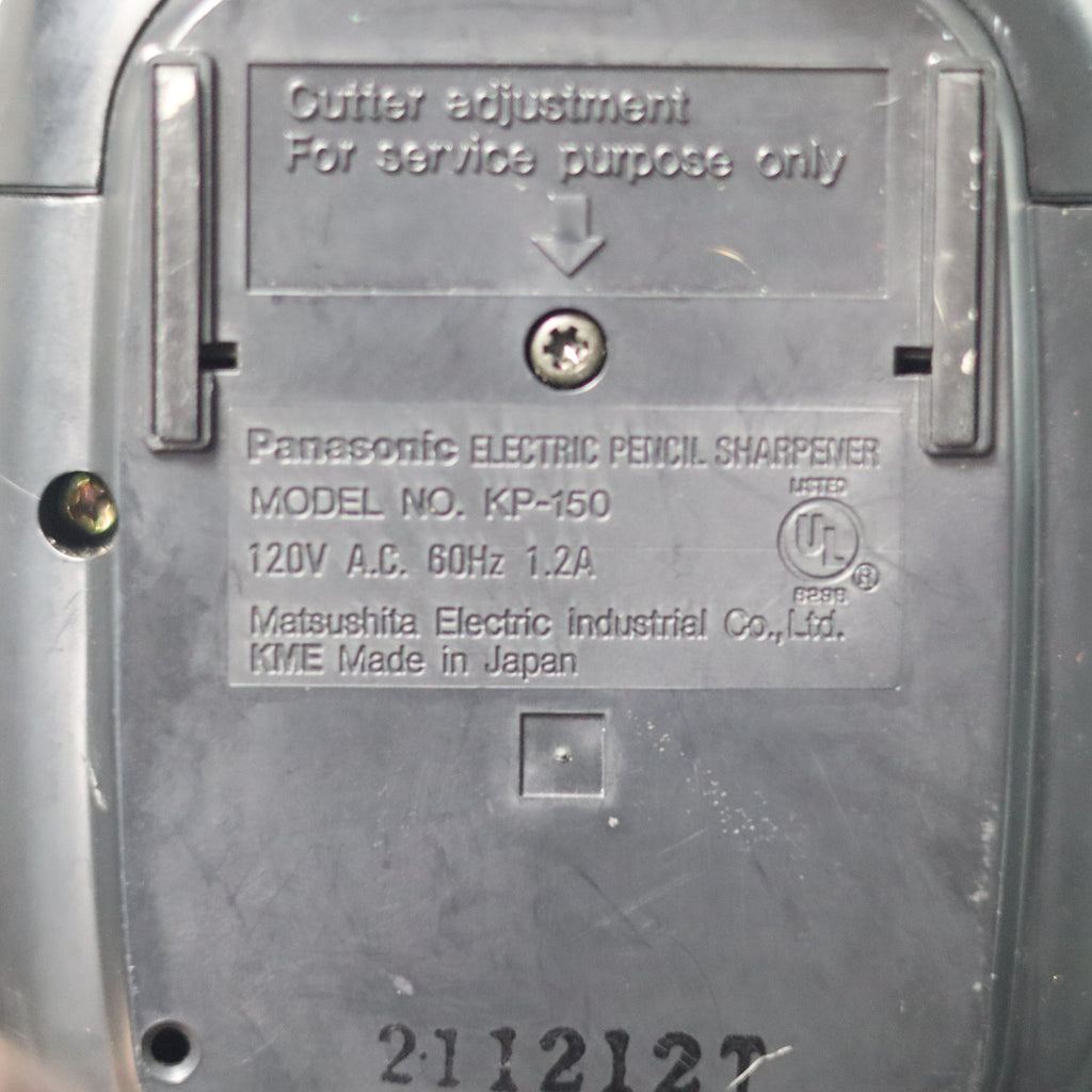 Back of a Panasonic electric pencil sharpener with model details.