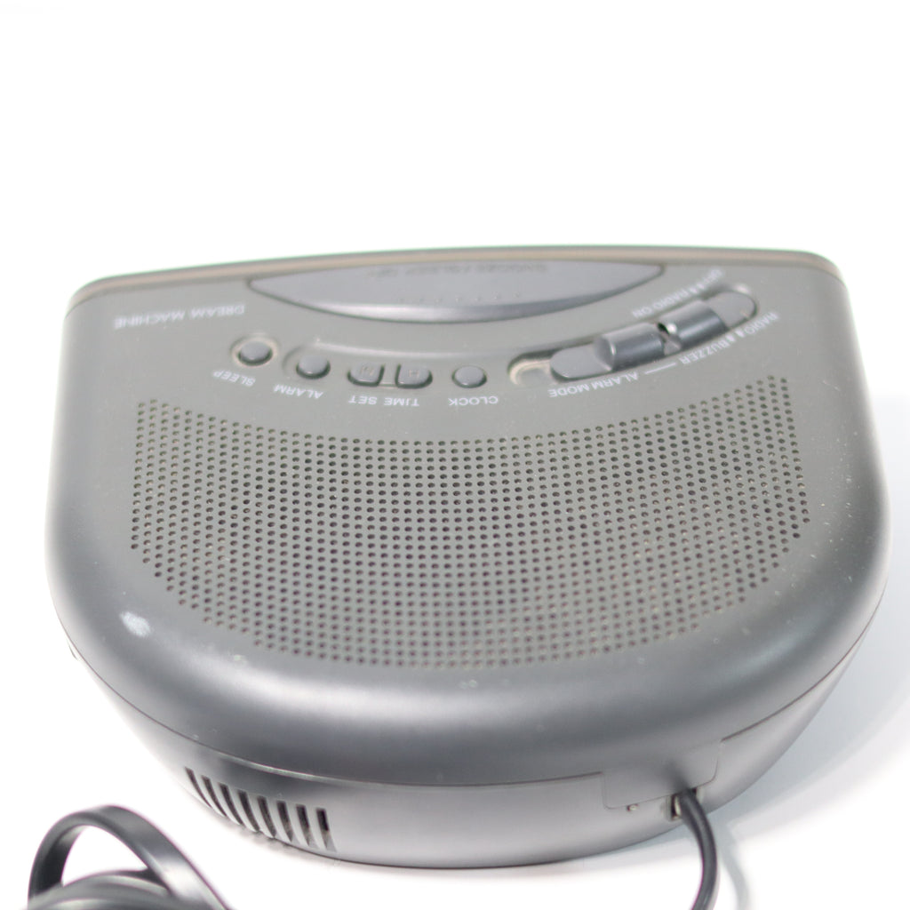 Gray electronic device with control buttons on a white background