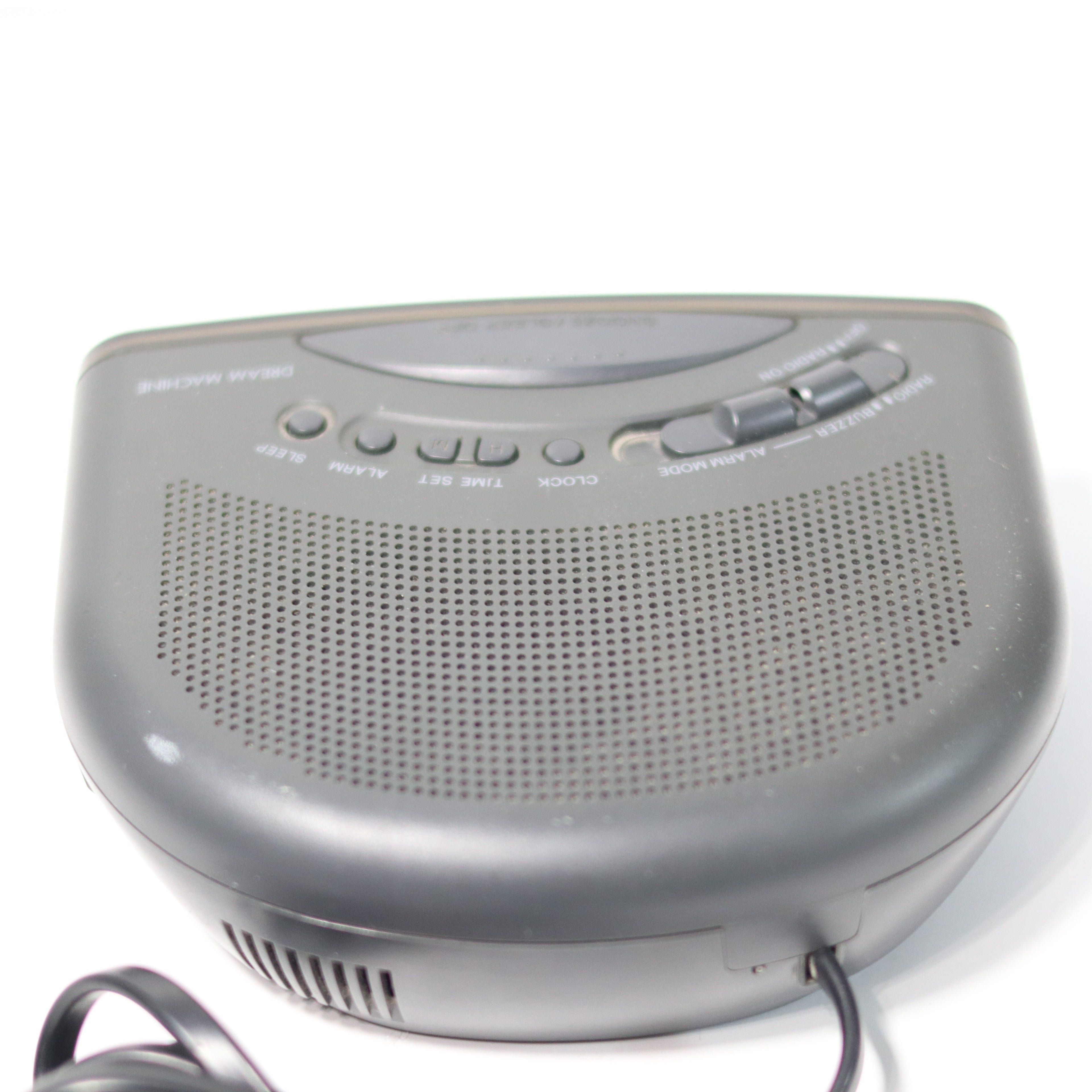 Gray electronic device with control buttons on a white background