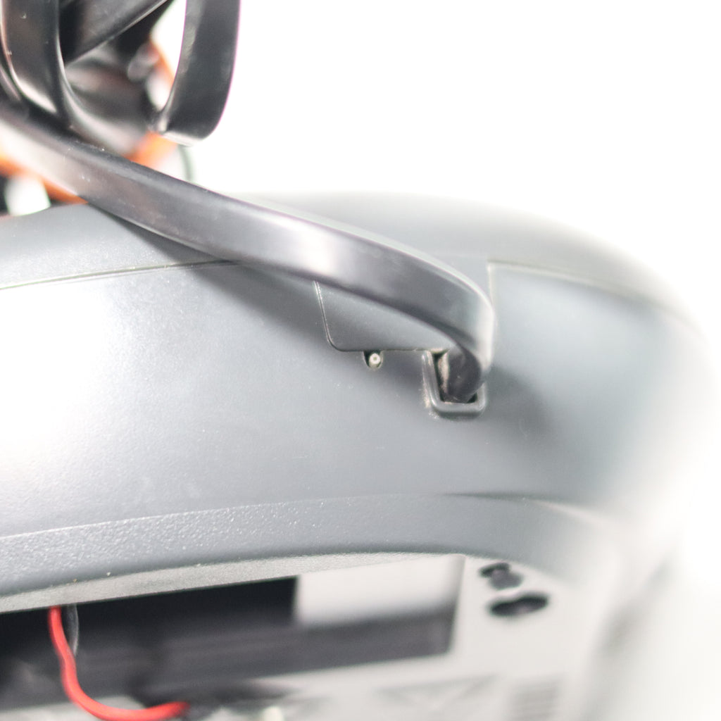 Close-up of a car interior with a focus on the door handle and panel.