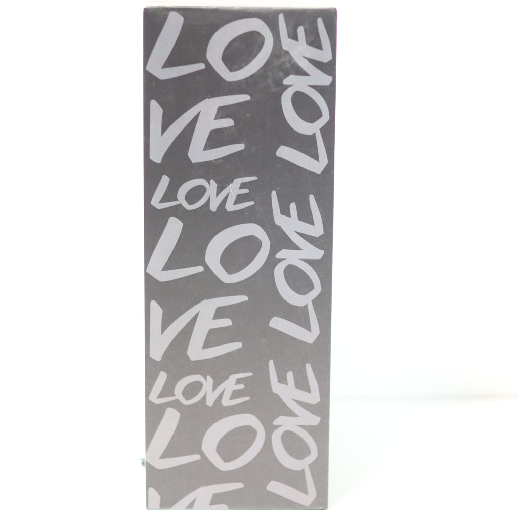 Gray towel with 'LOVE' text pattern on a white background