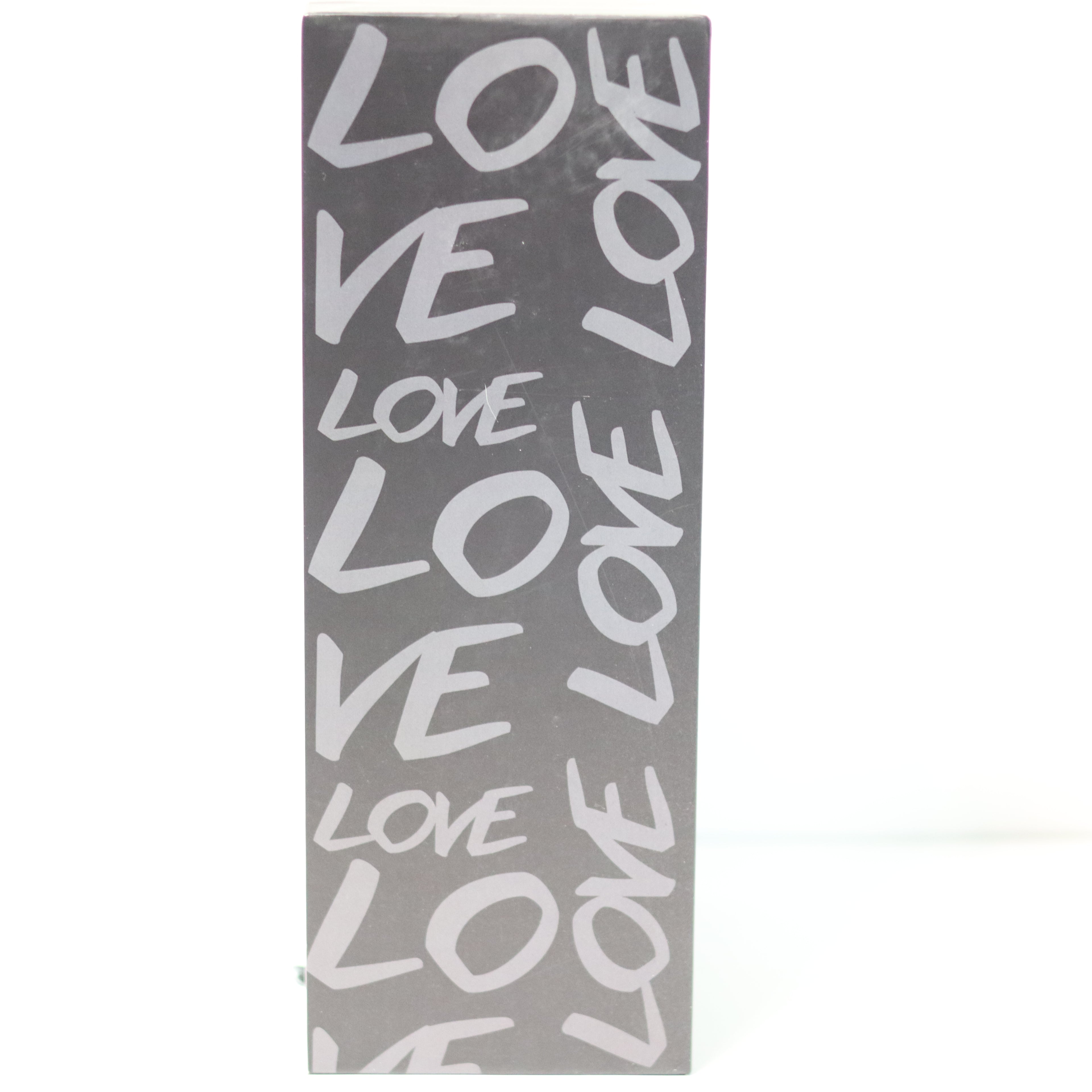Gray towel with 'LOVE' text pattern on a white background