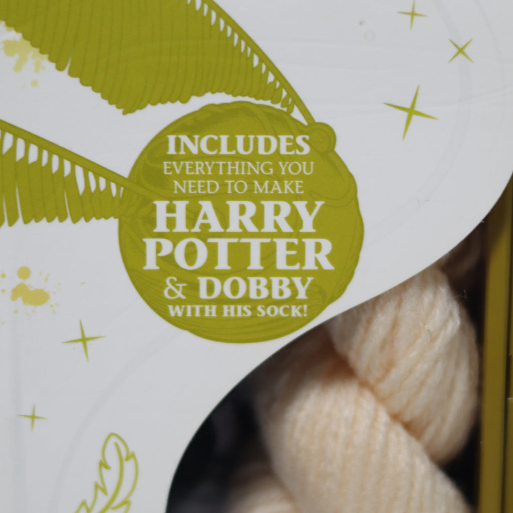 Yarn kit packaging with text 'Includes everything you need to make Harry Potter & Dobby with his sock!'