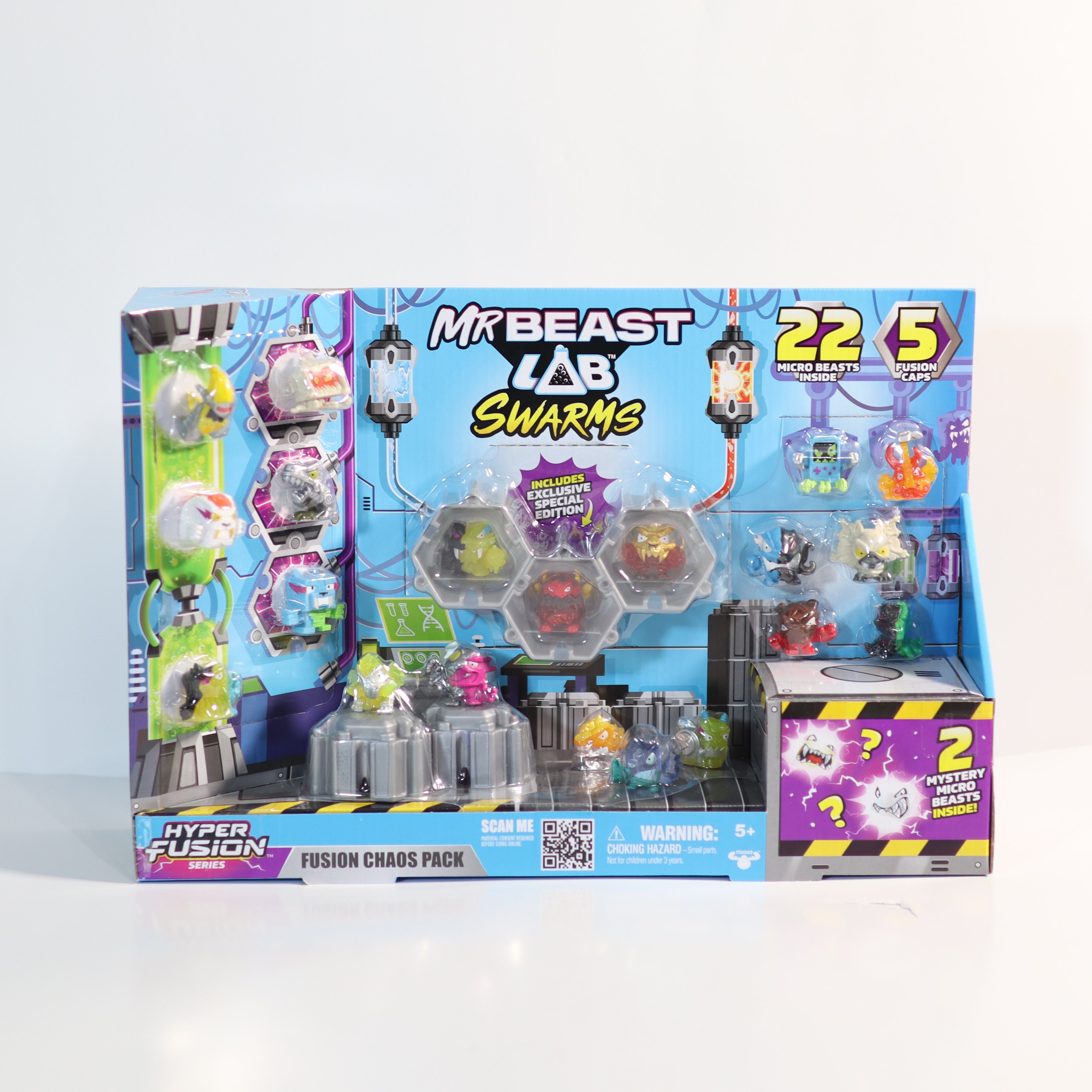 Toy packaging with figures and colorful design on a white background