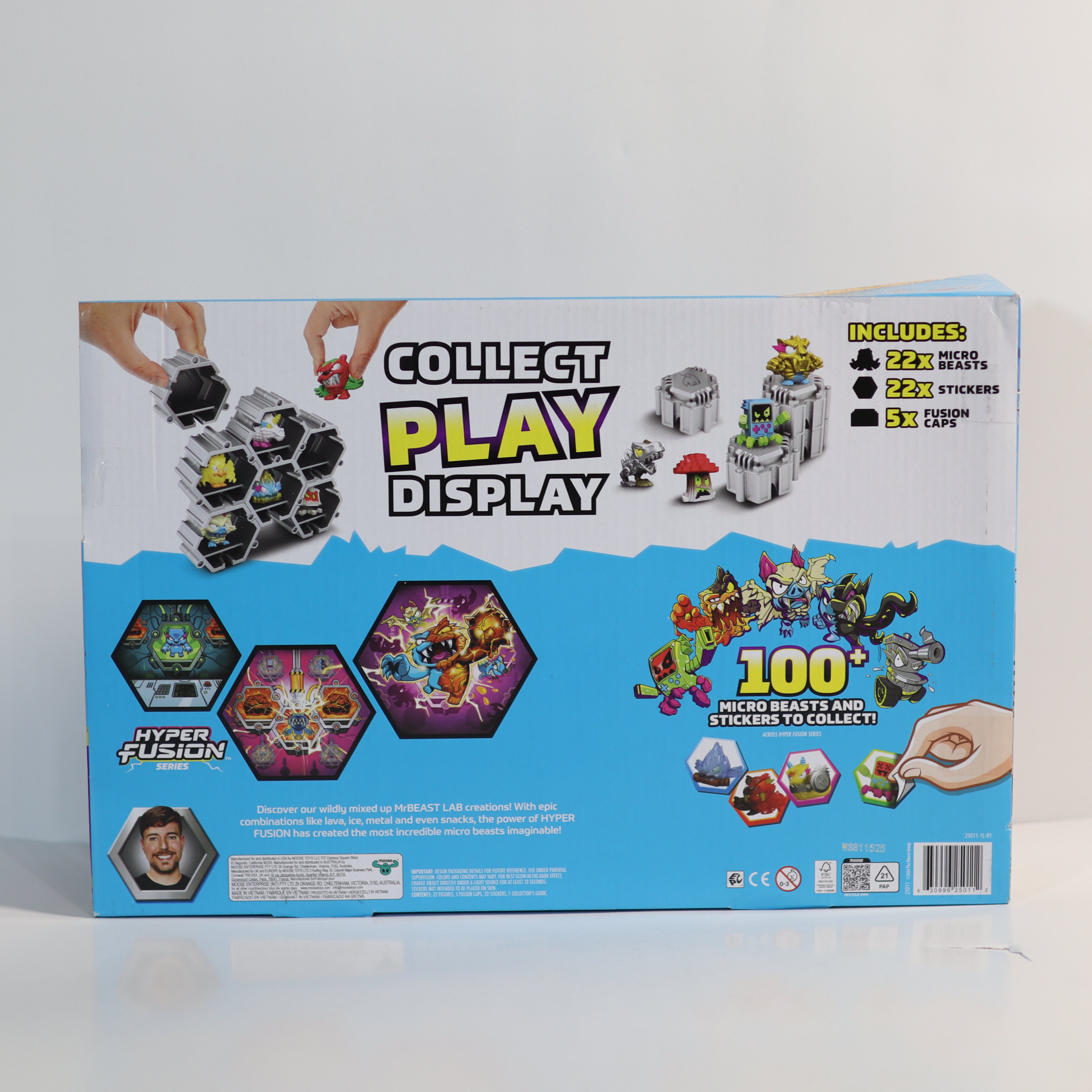 Toy packaging with 'Collect, Play, Display' text and toy figures on a white background
