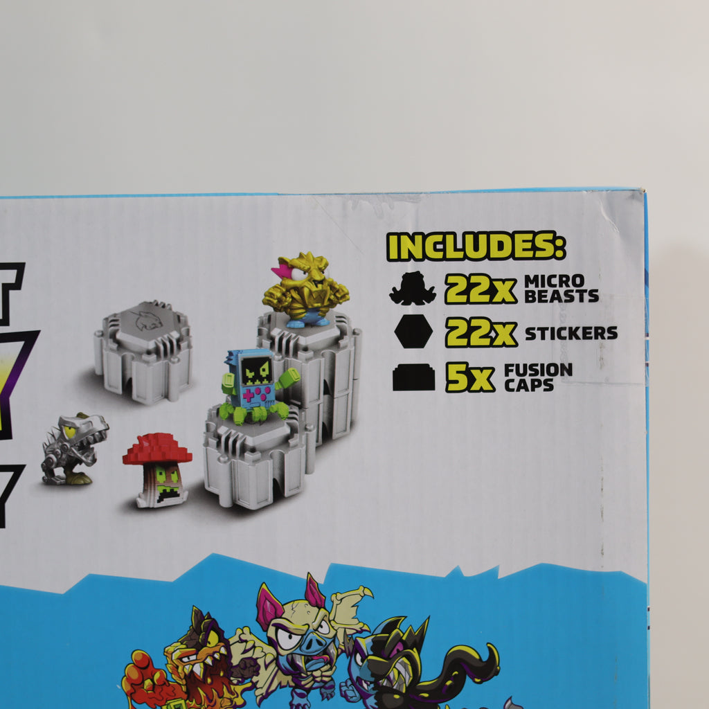 Toy packaging with micro beasts, stickers, and fusion caps on a white background