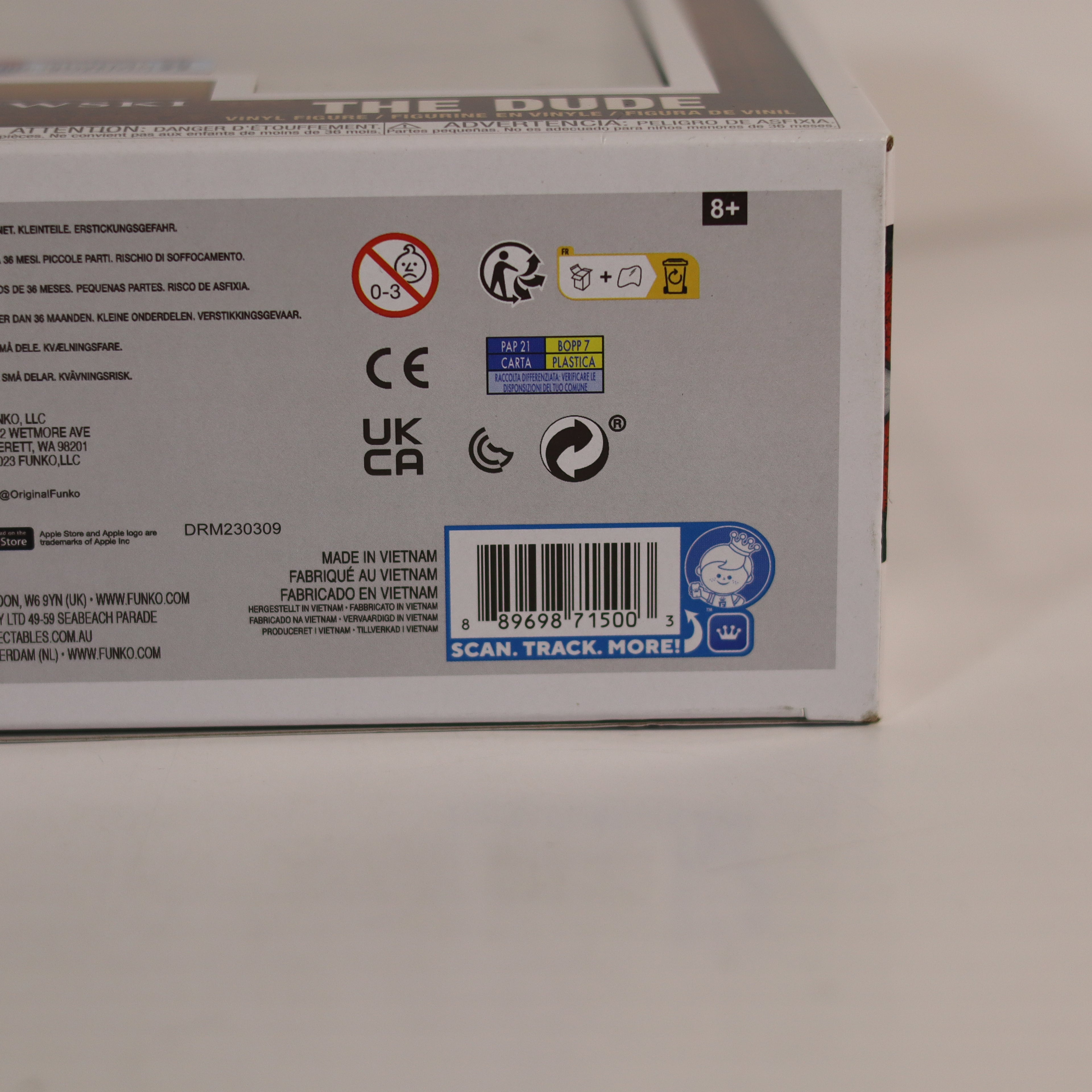 Back of a product box with various labels and icons on a light background