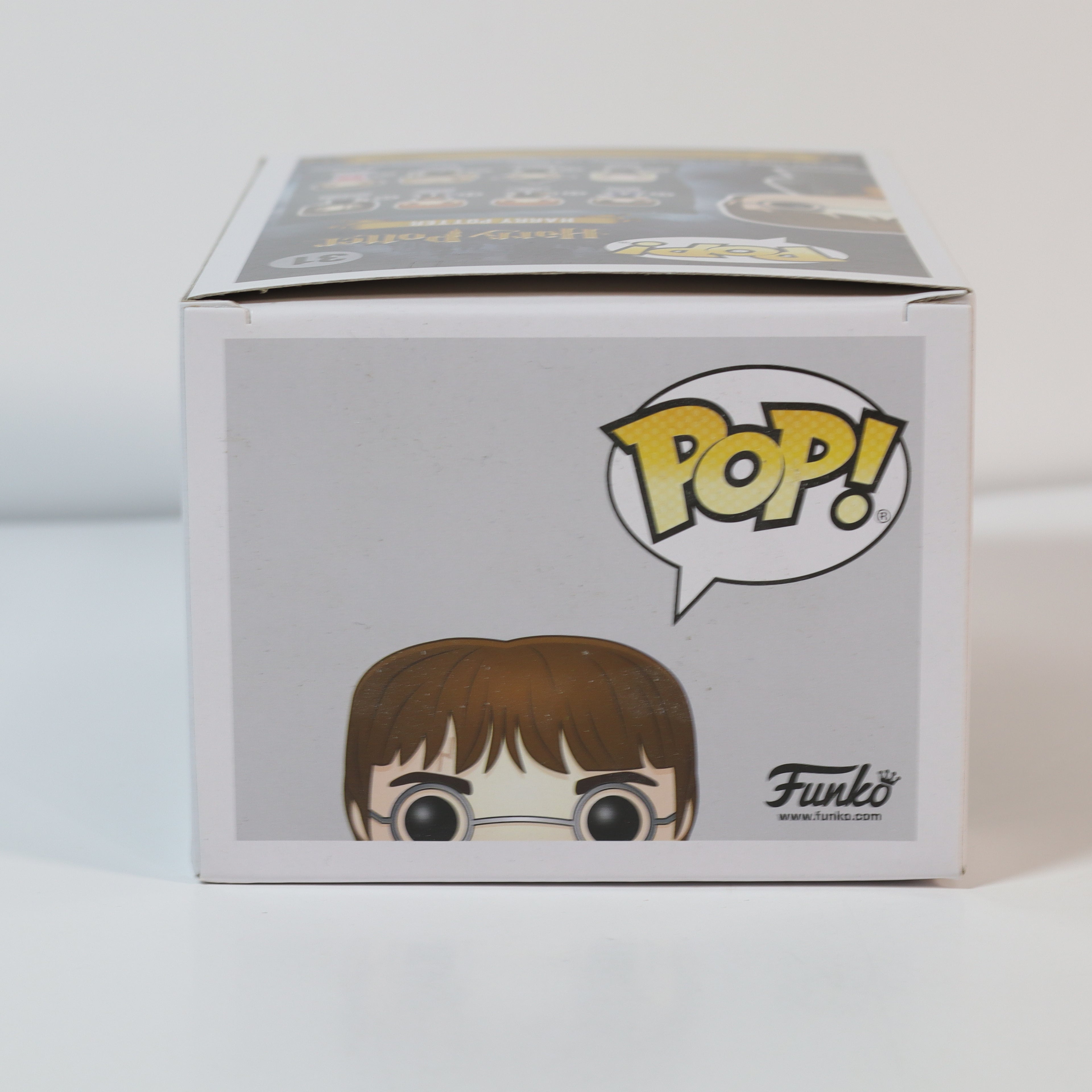 Funko Pop! vinyl figure packaging with character illustration and Funko logo on a light gray background