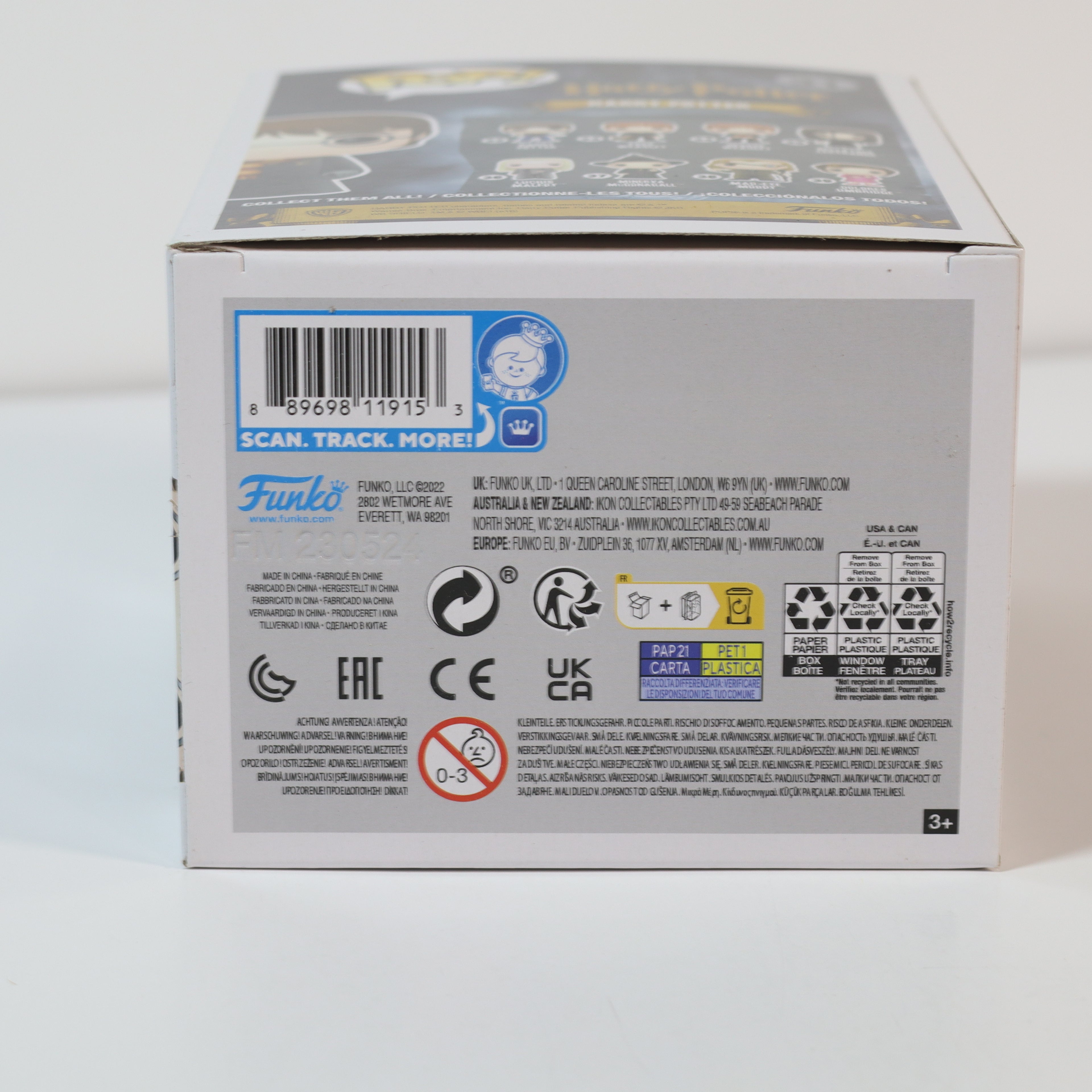 Back view of a product box with various labels and icons on a white background