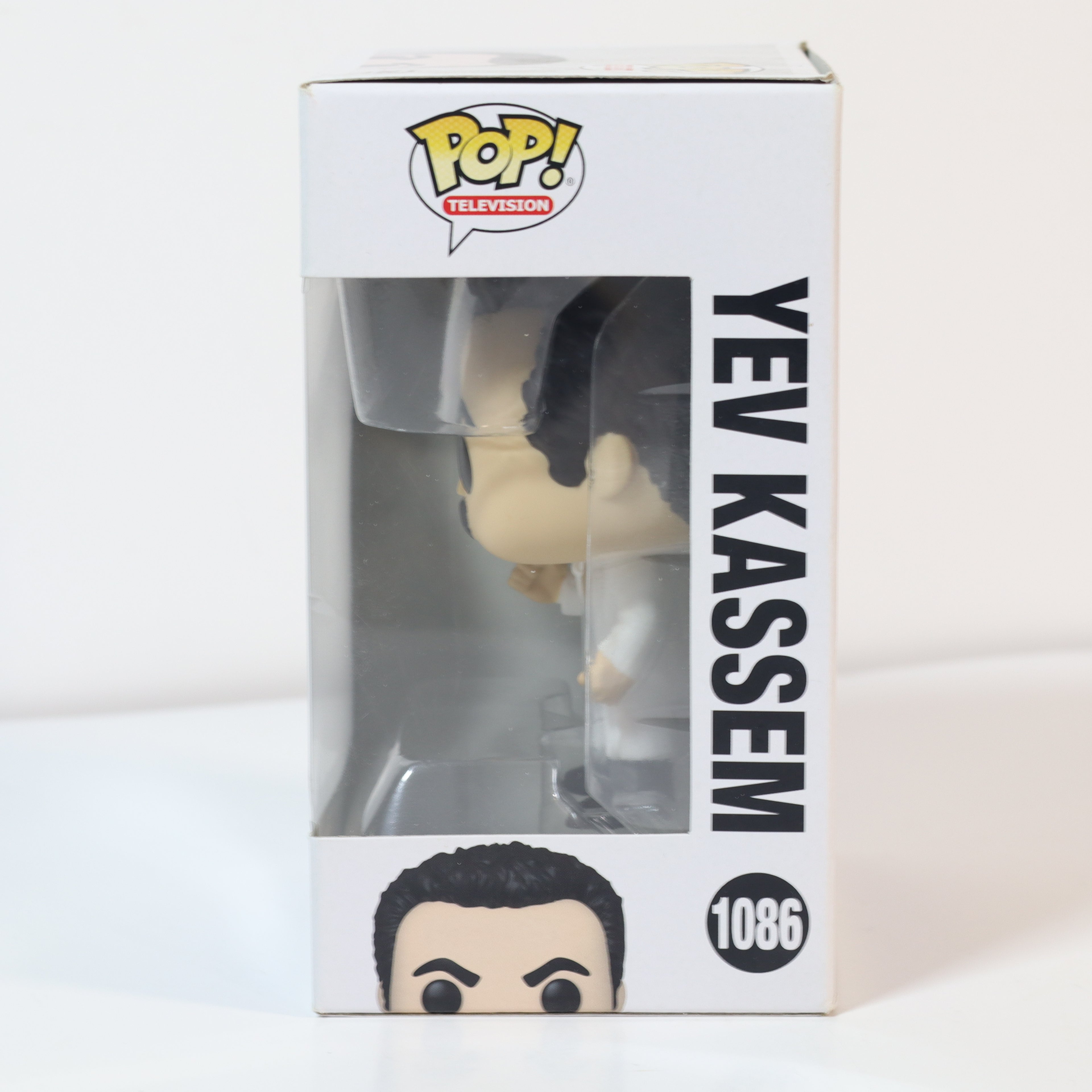 Funko Pop! vinyl figure in packaging with 'Yev Kassem' branding on a white background