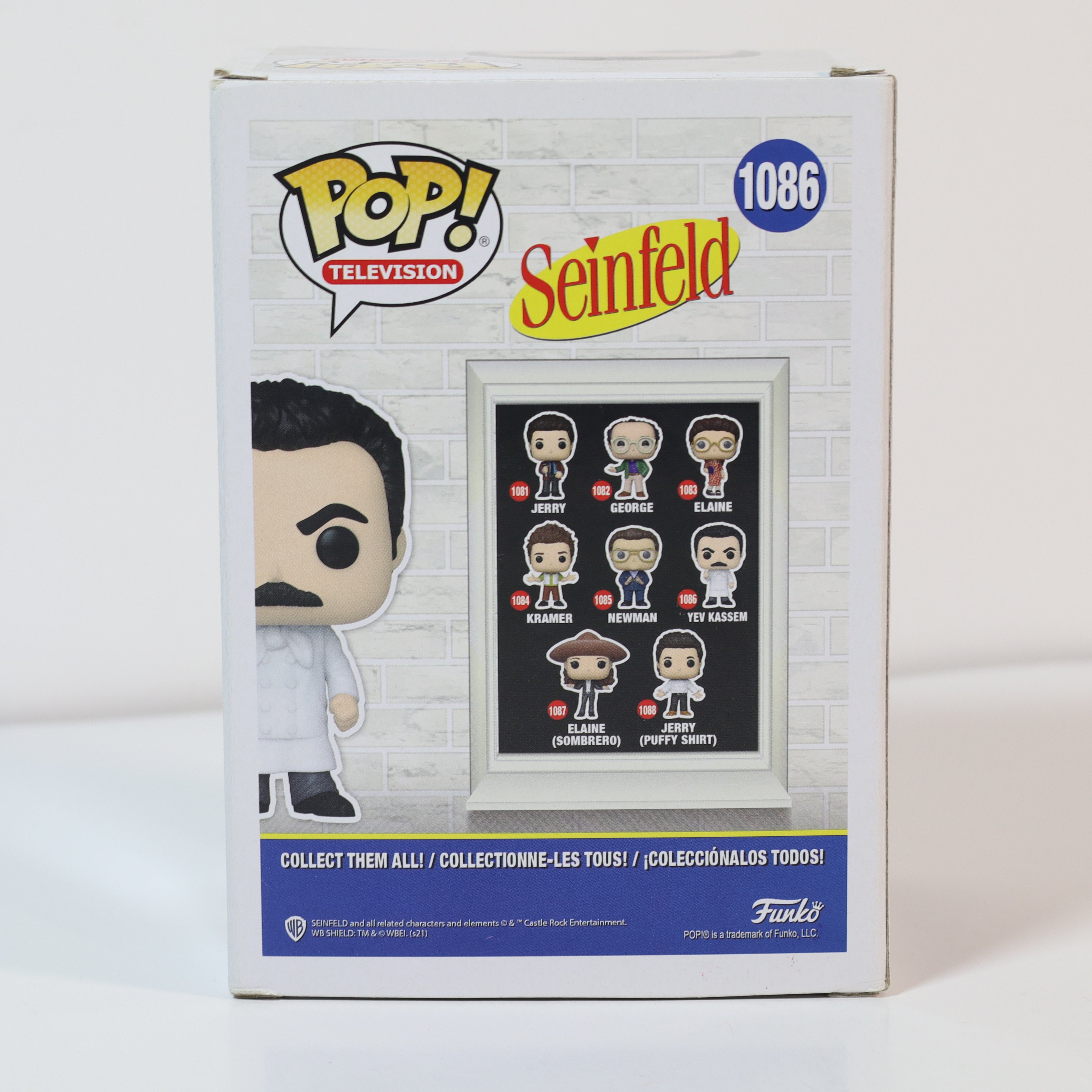 Funko Pop! Seinfeld figure packaging with character illustrations on a white background