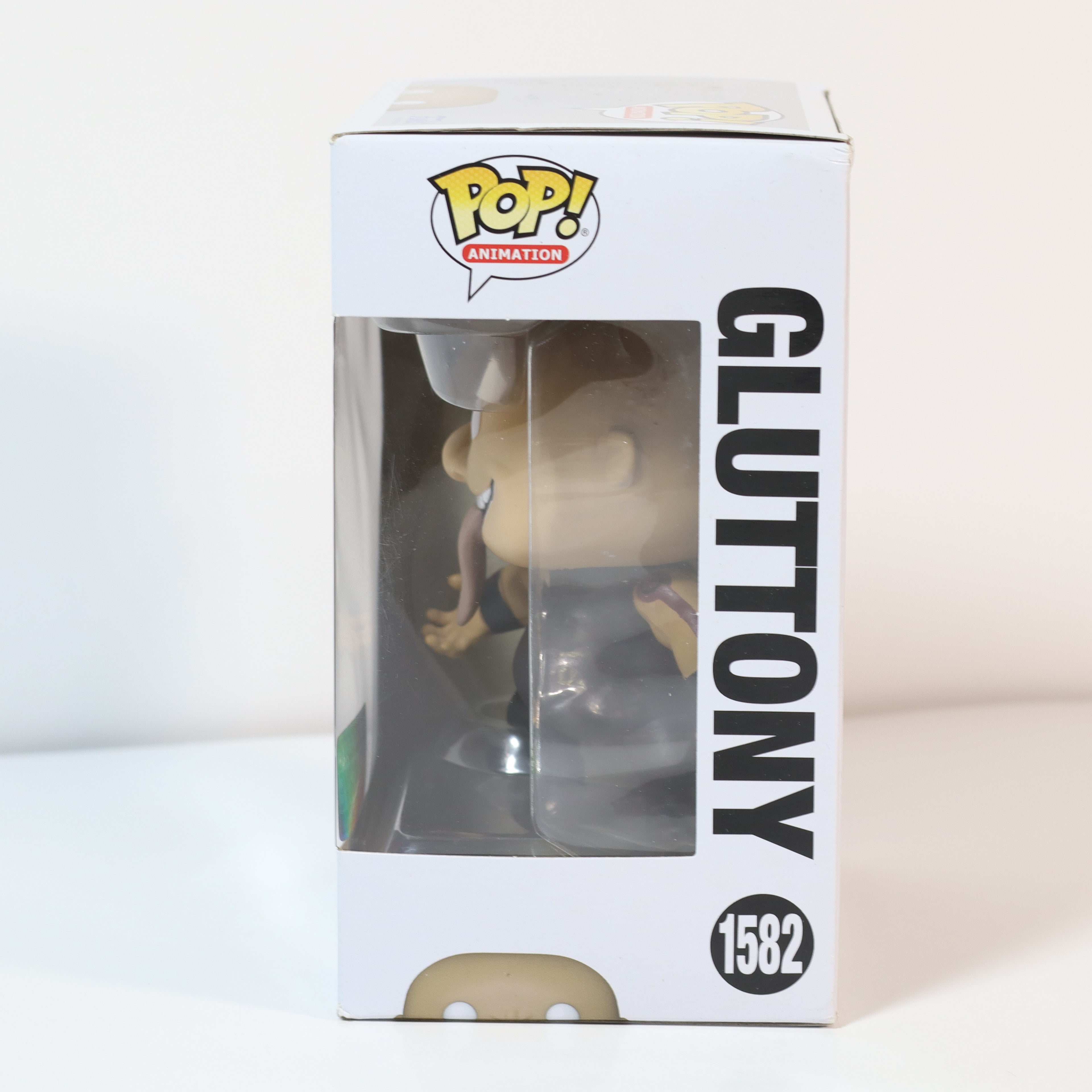 Funko Pop! Gluttony figure packaging on a white background