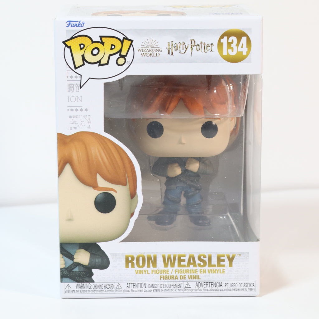 Funko Pop! Ron Weasley vinyl figure packaging with branding and product details.