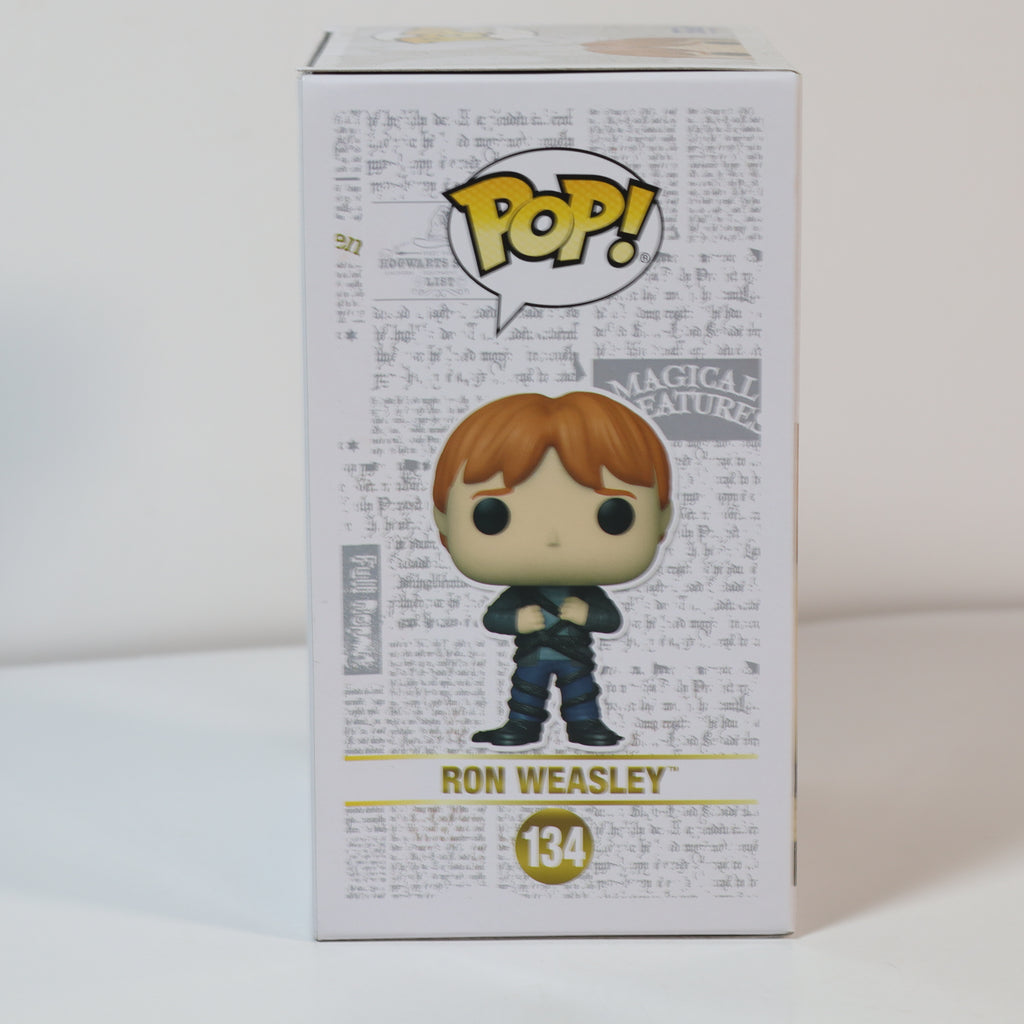 Funko Pop! vinyl figure packaging with Ron Weasley on a white background