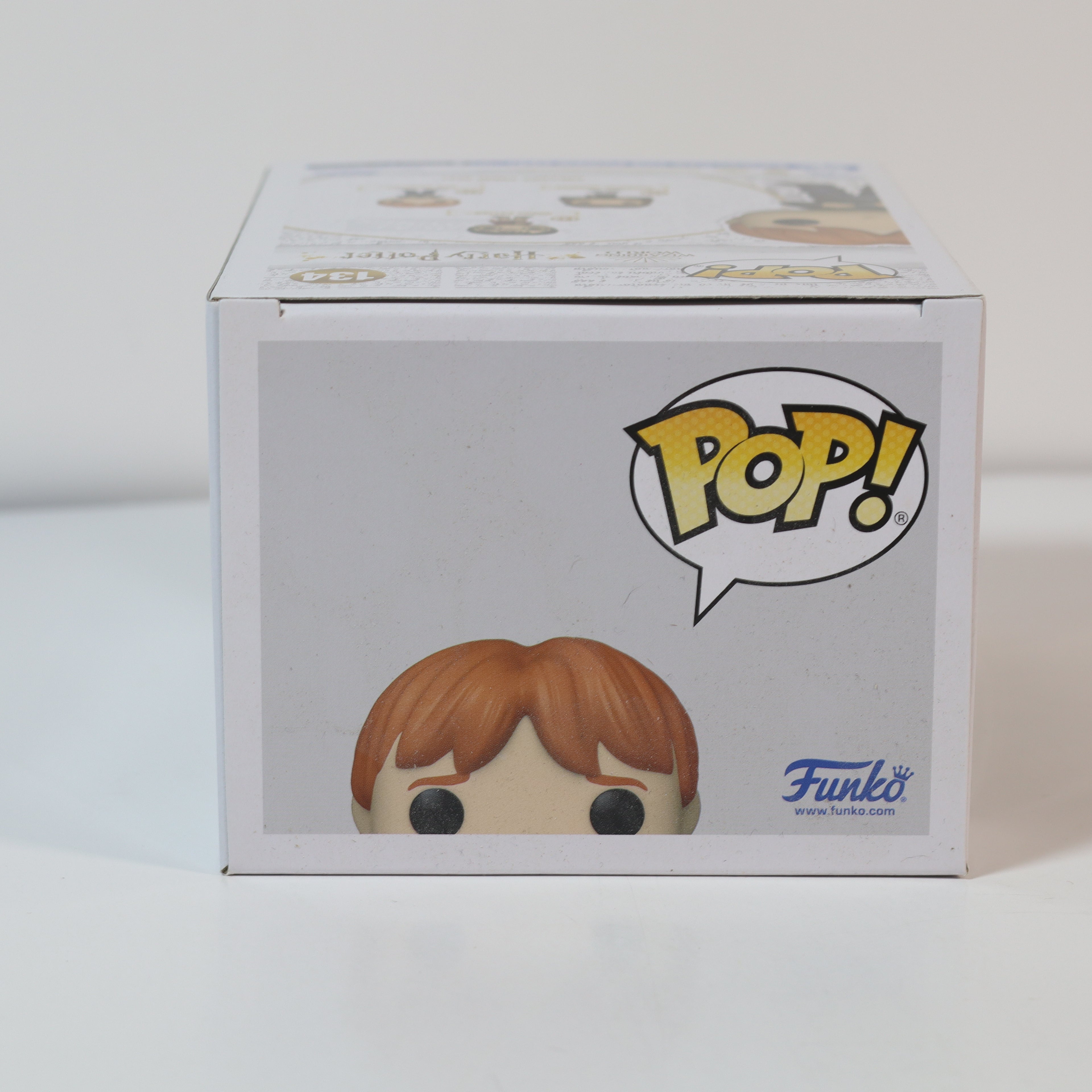 Funko Pop! vinyl figure packaging with character illustration and Funko logo on a white background