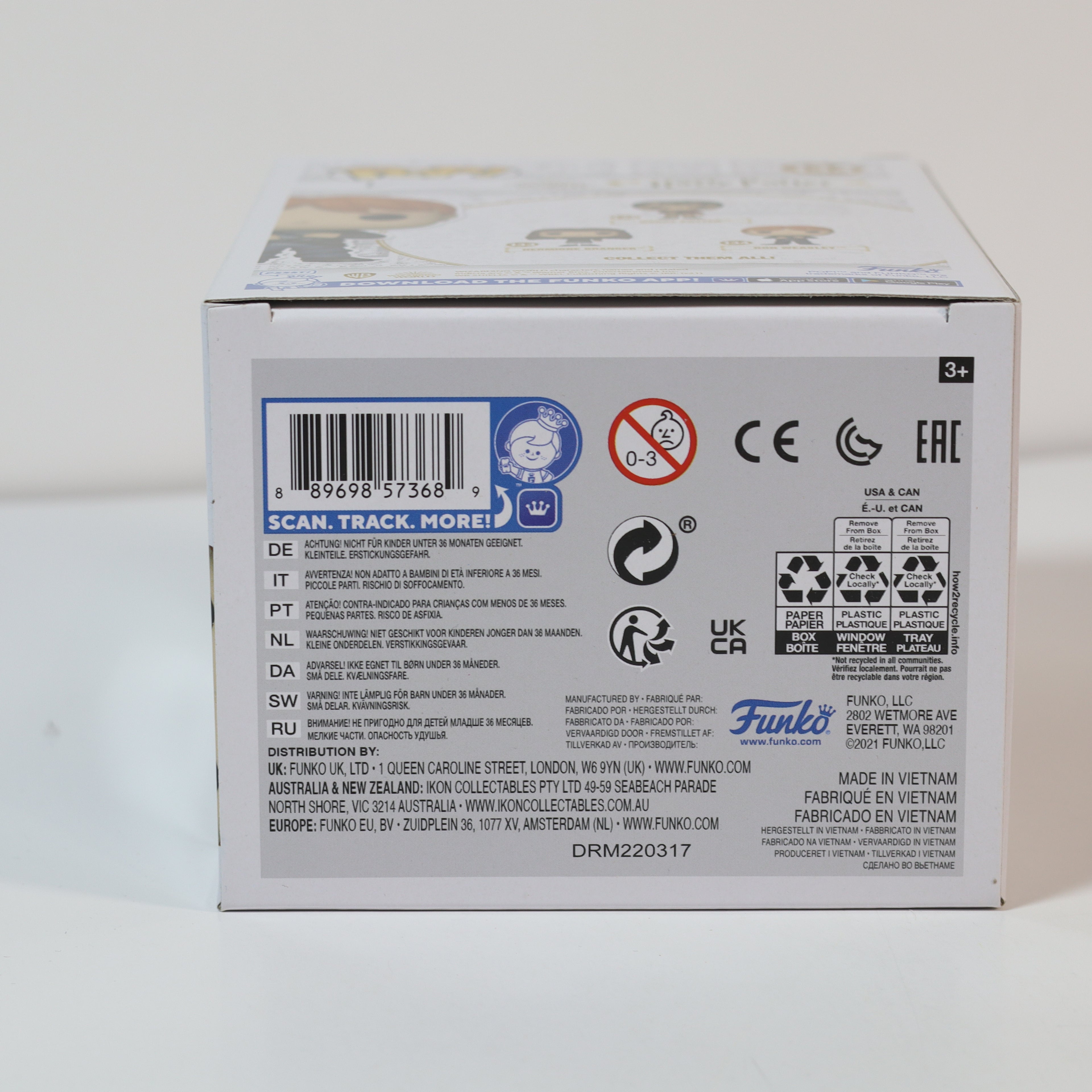 Back of a product box with various labels and text on a white background