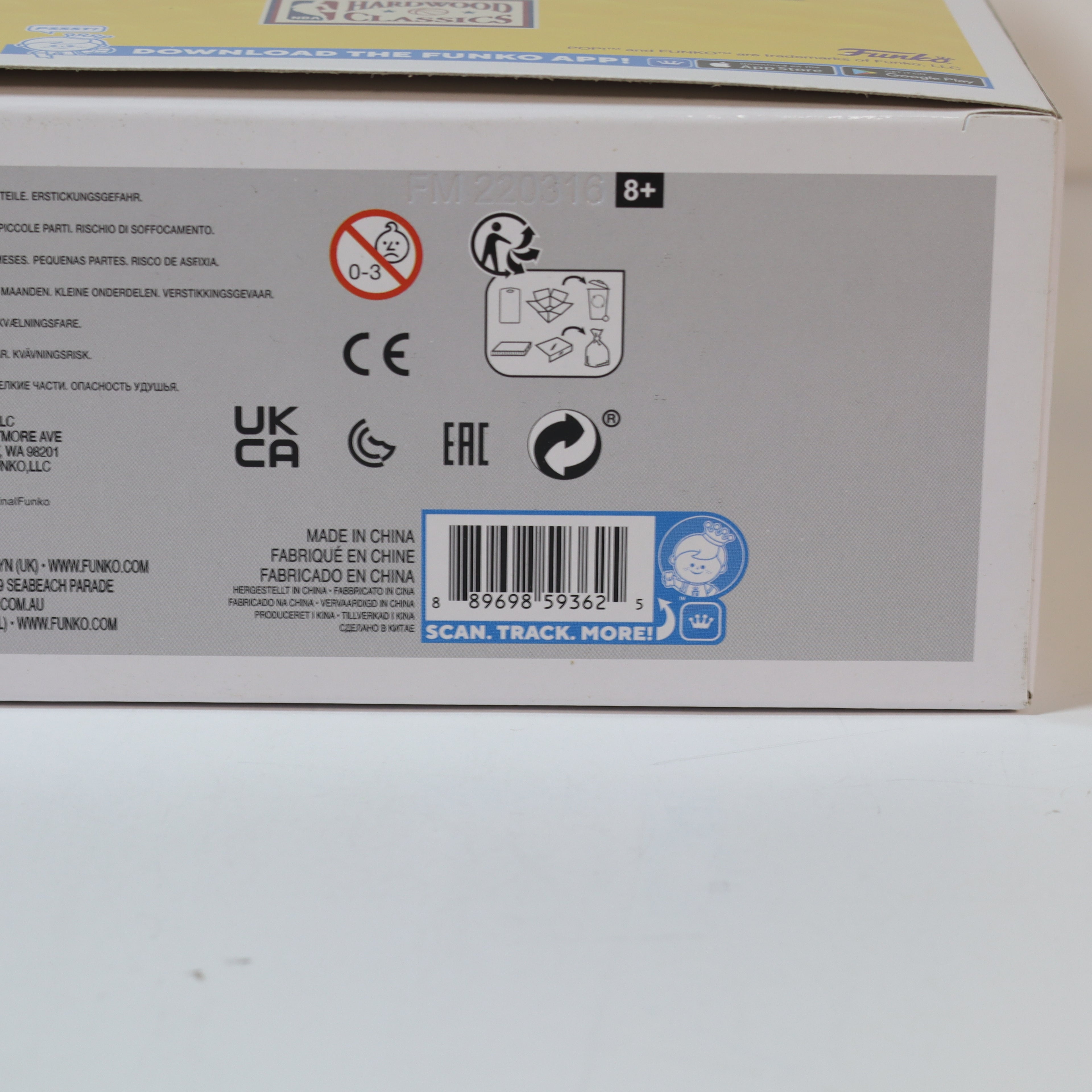 Back of a product box with various symbols and text