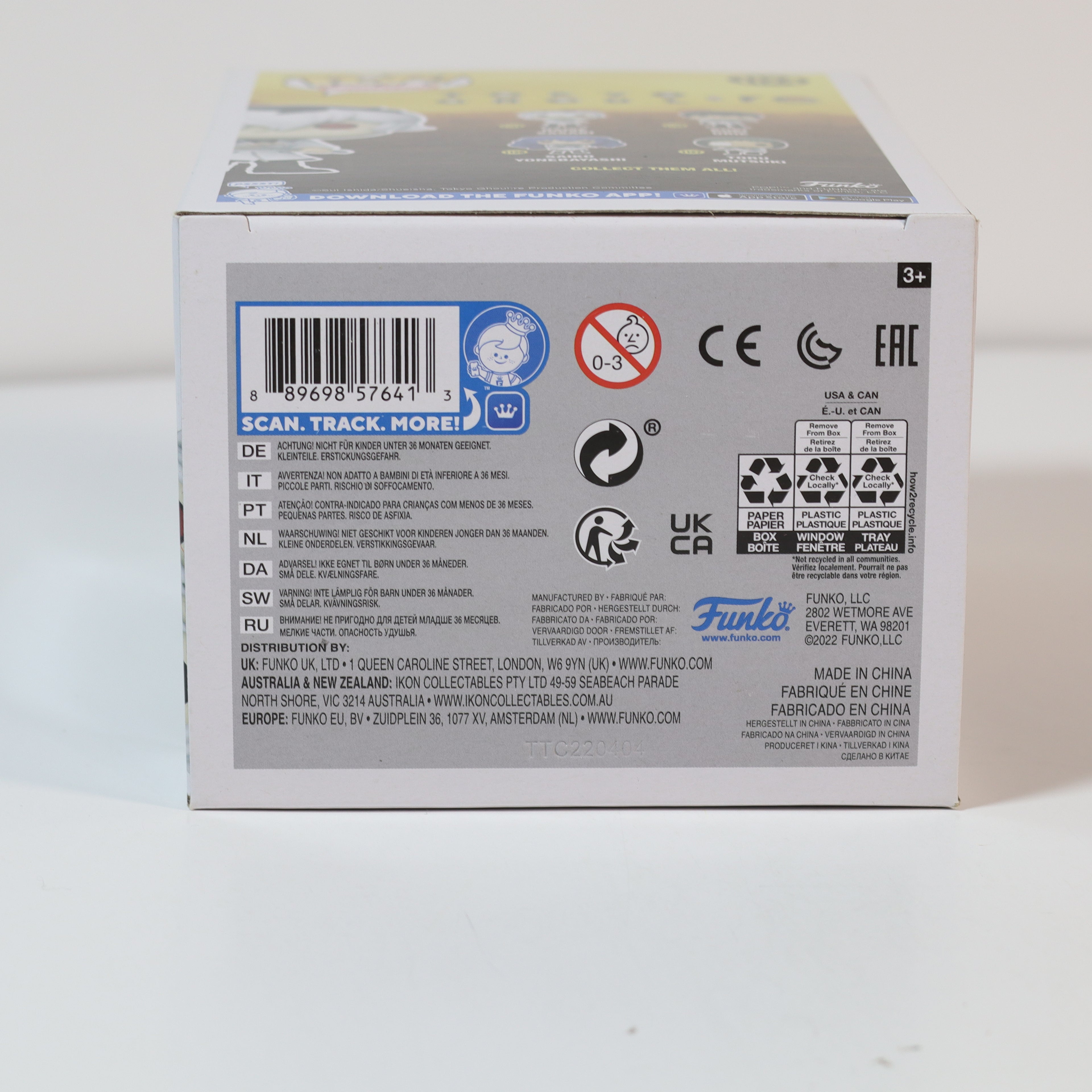 Back of a product box with various labels and text on a white background