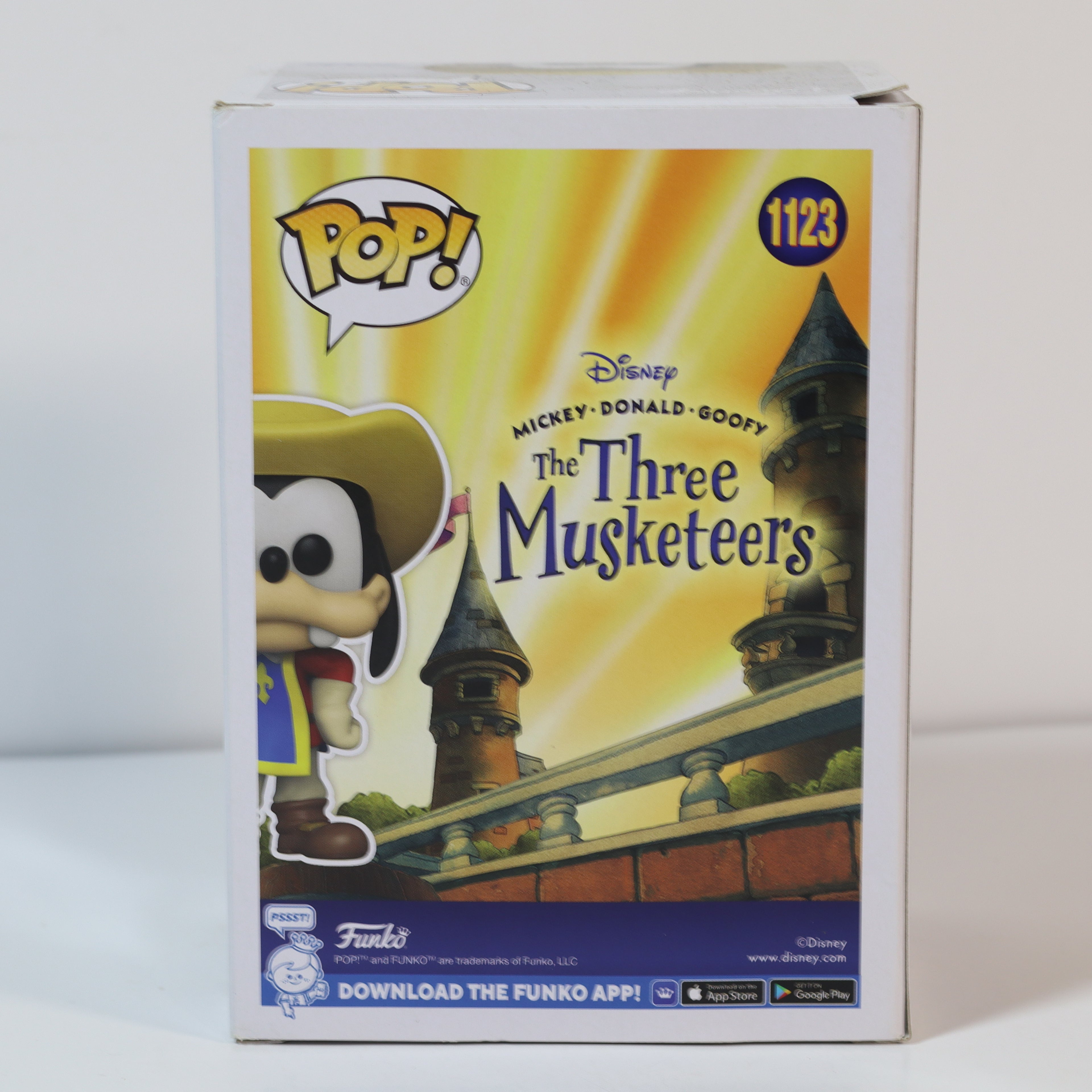 Funko Pop! packaging for Disney's The Three Musketeers with a cartoon character on a yellow background.