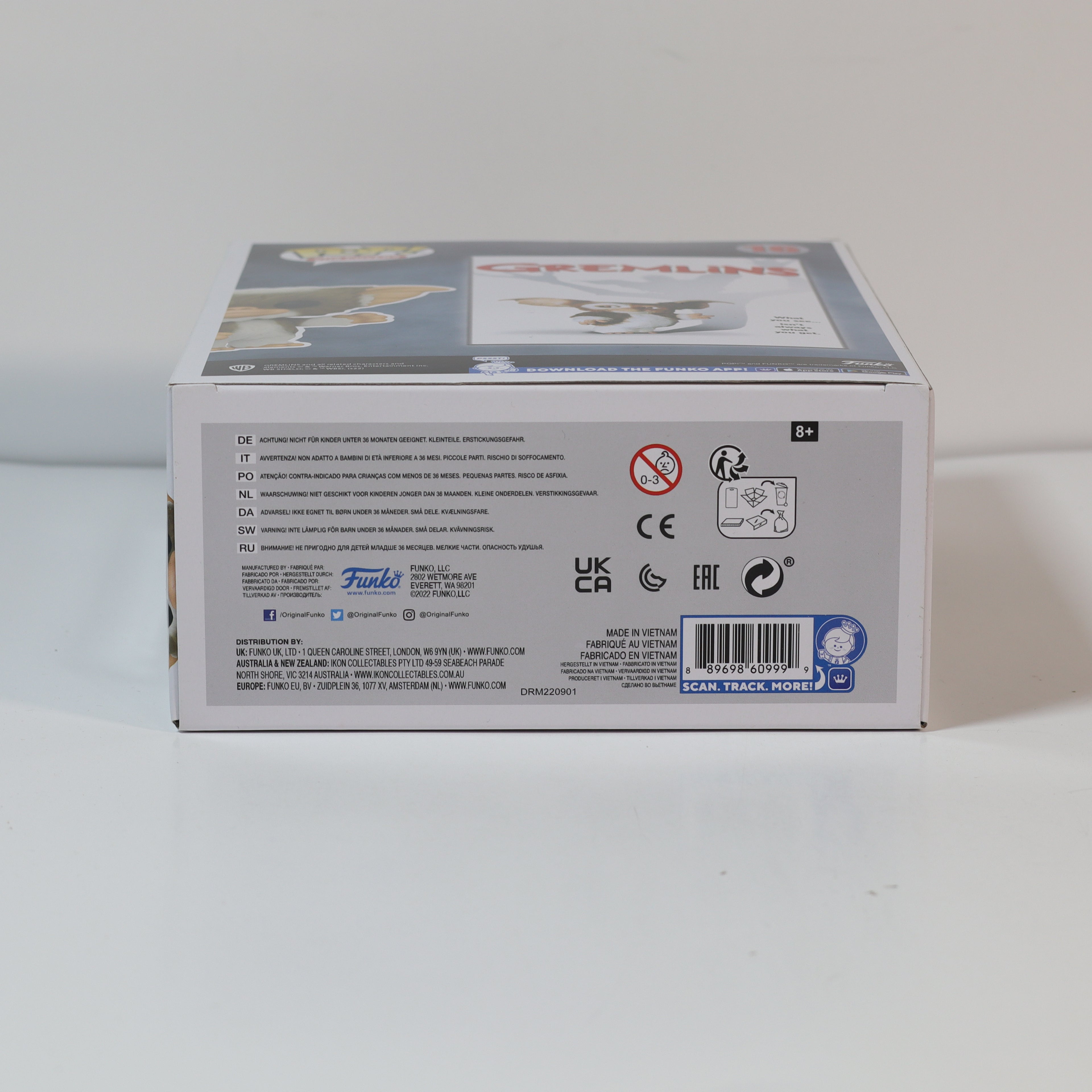 Back view of a product box with branding and labels on a white background