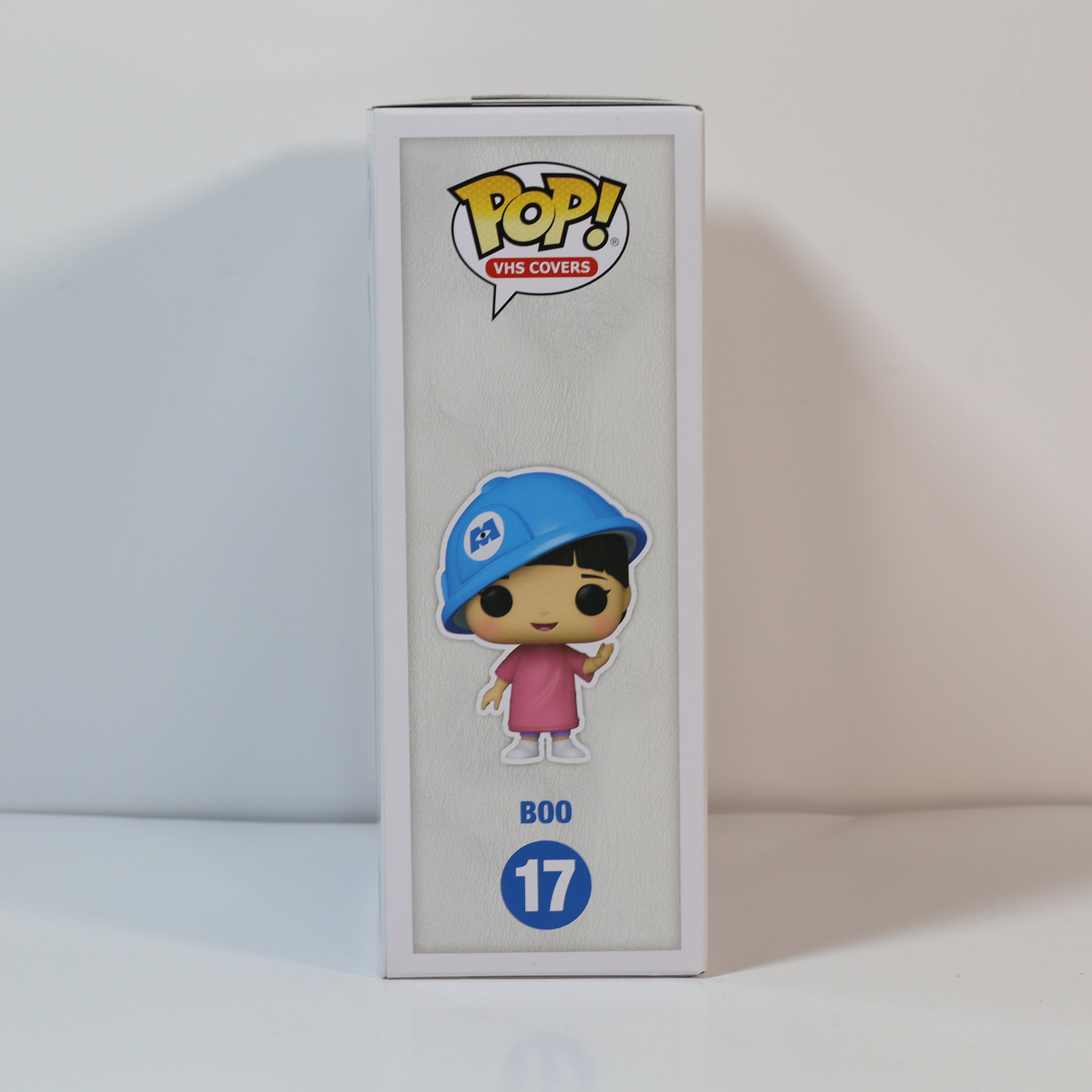 Funko Pop! vinyl figure packaging with character wearing a blue cap and pink shirt on a white background