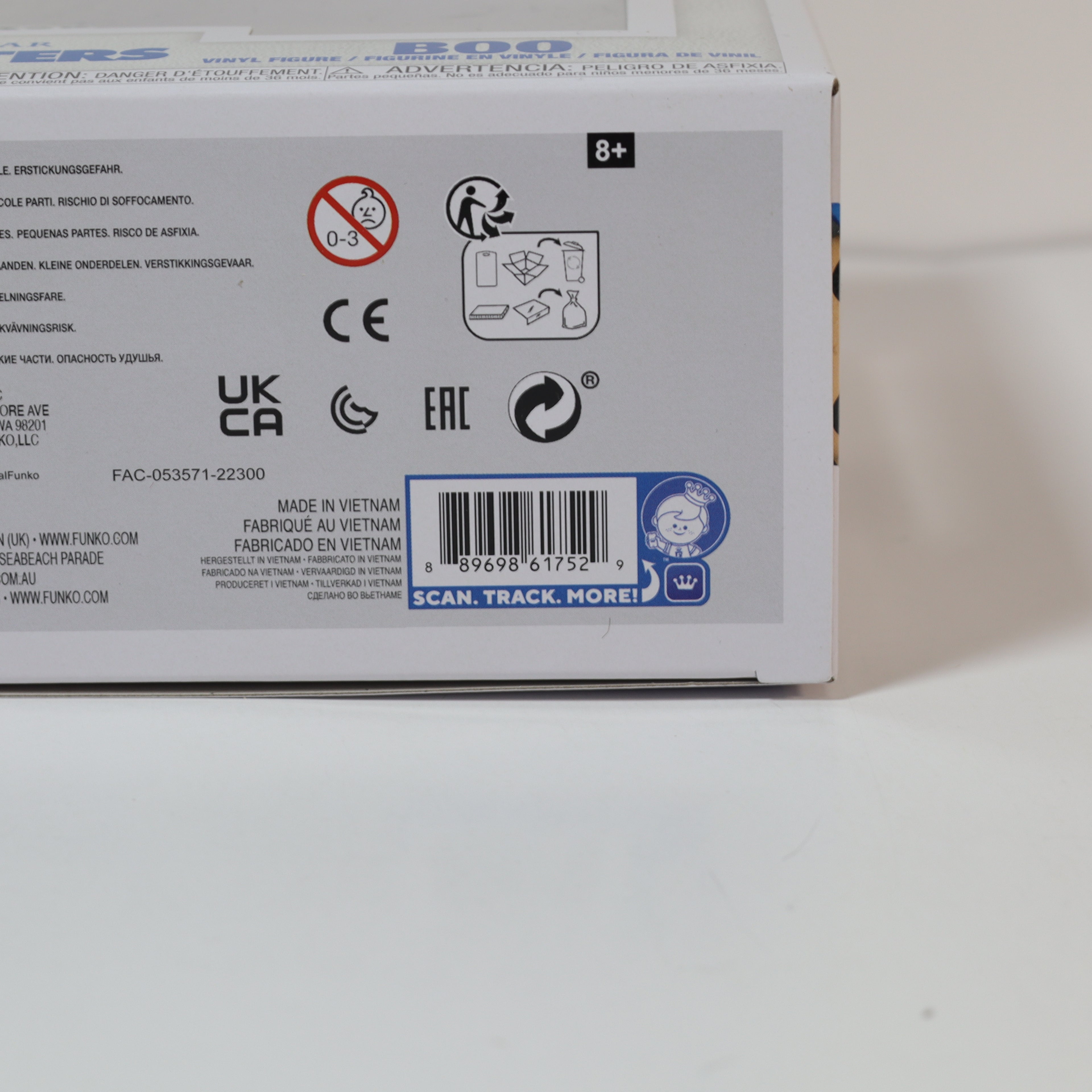 Back of a product box with various symbols and text on a white background