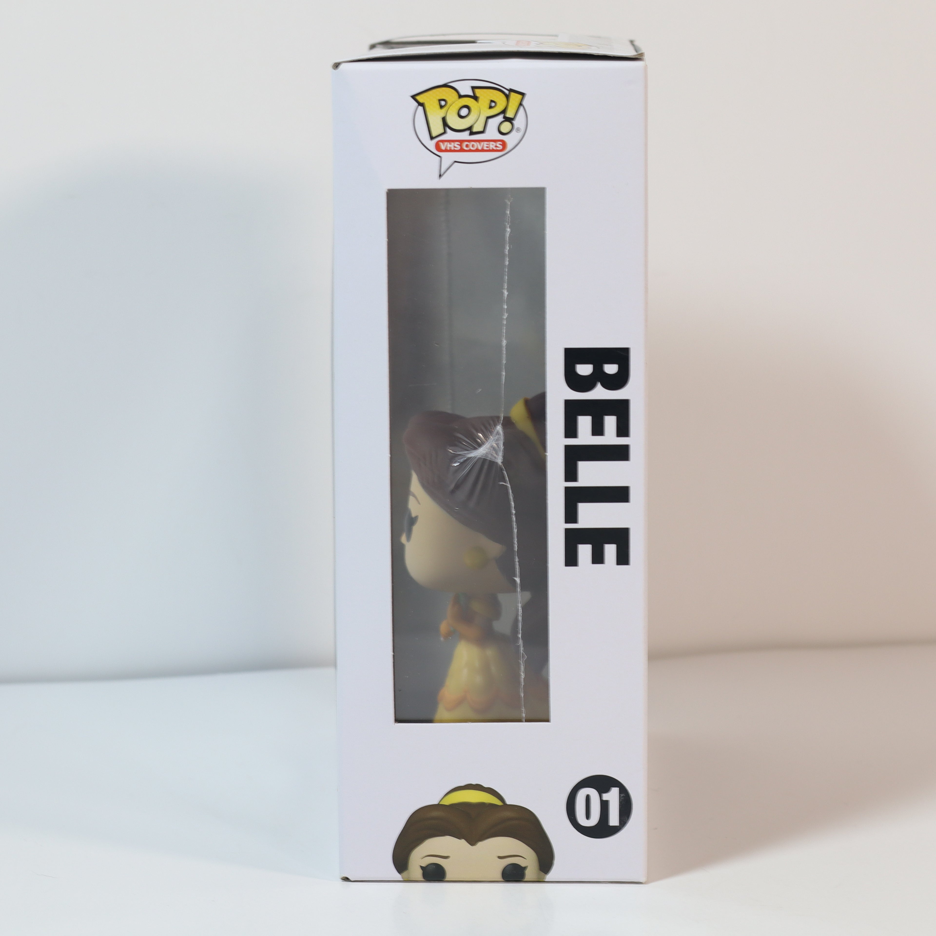 Pop! Vinyl box featuring a character named 'Belle' on a white background