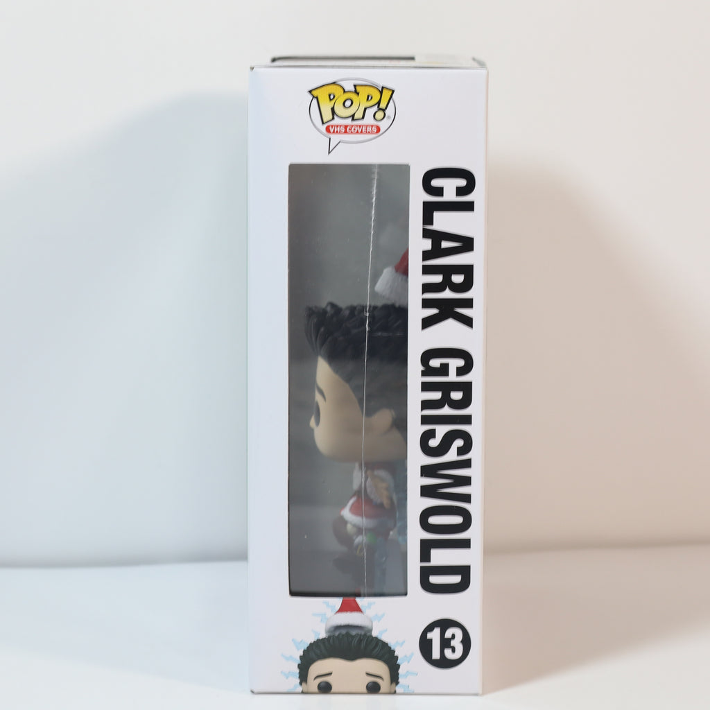 Boxed Pop! Vinyl figure of Clark Griswold with a white background