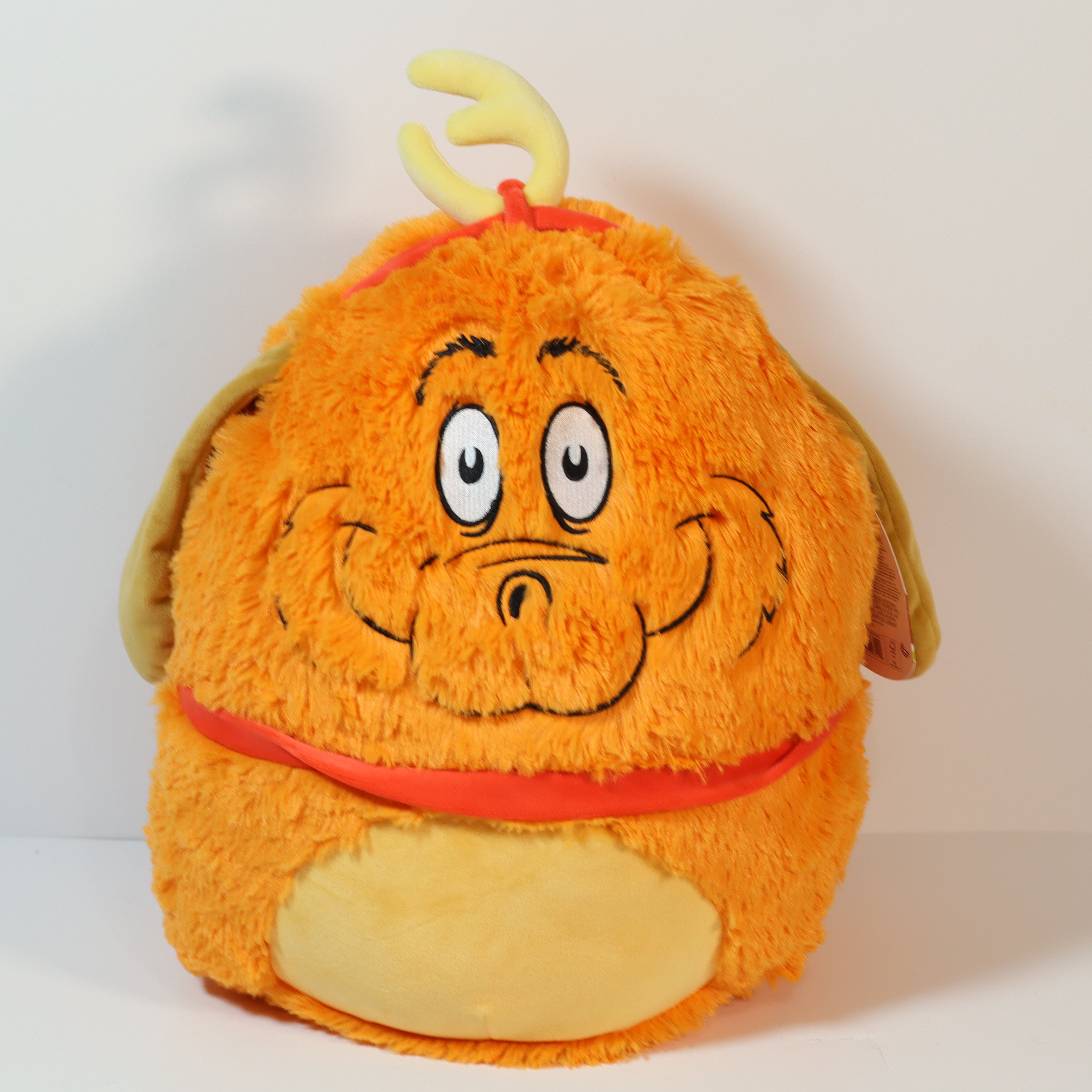 Plush toy with a cartoonish design on a white background