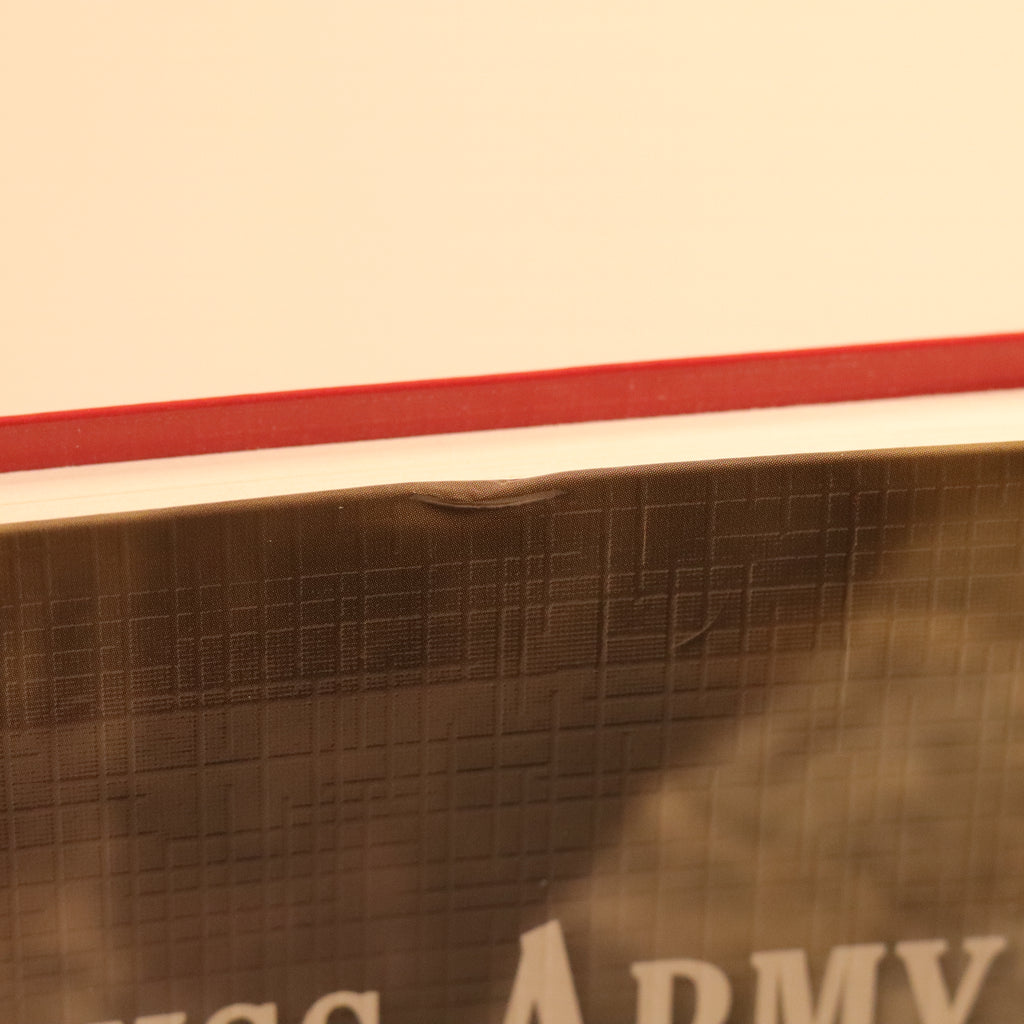 Close-up of a cardboard box with 'U.S. Army' branding on a beige background