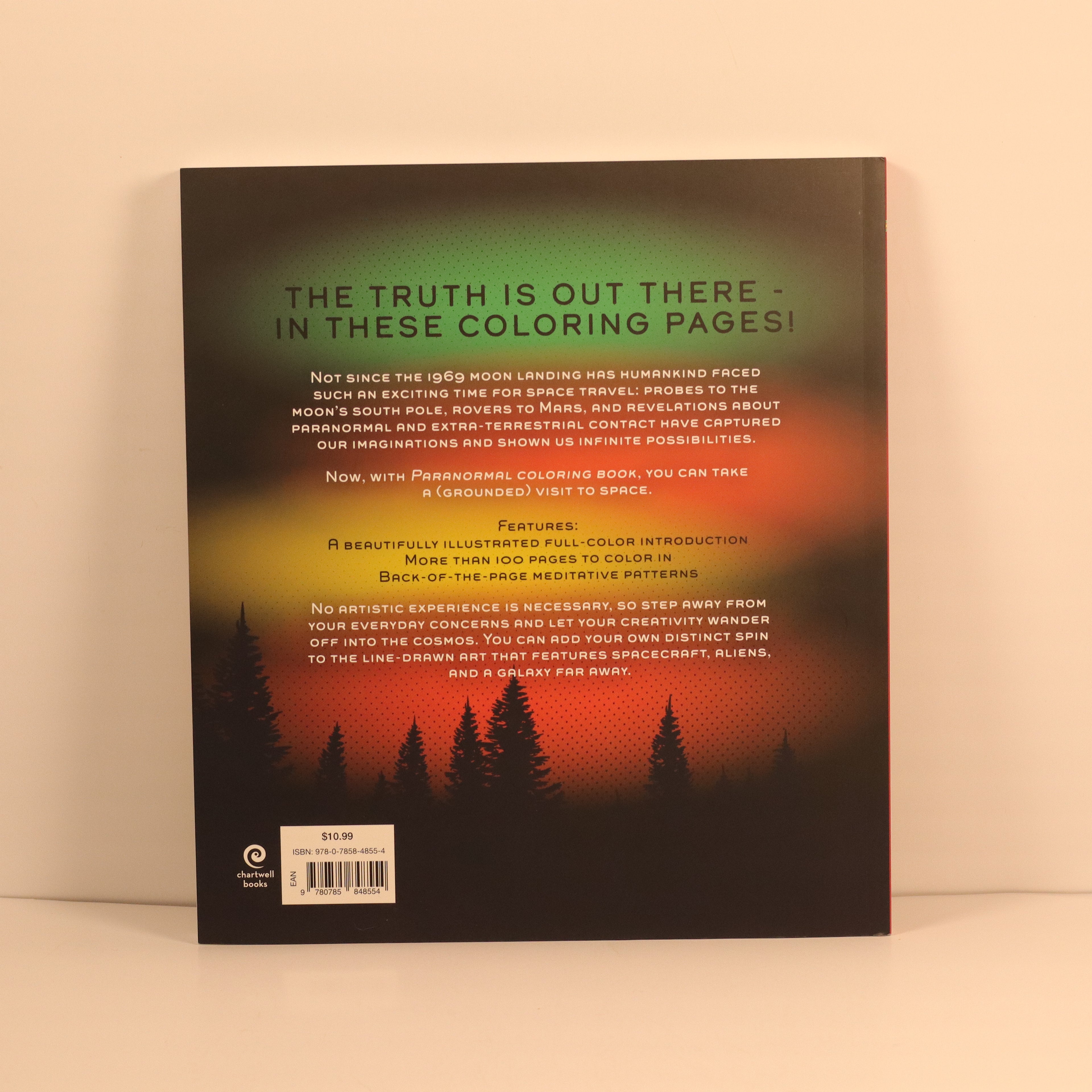 Back cover of a coloring book with text and space-themed illustration on a beige background