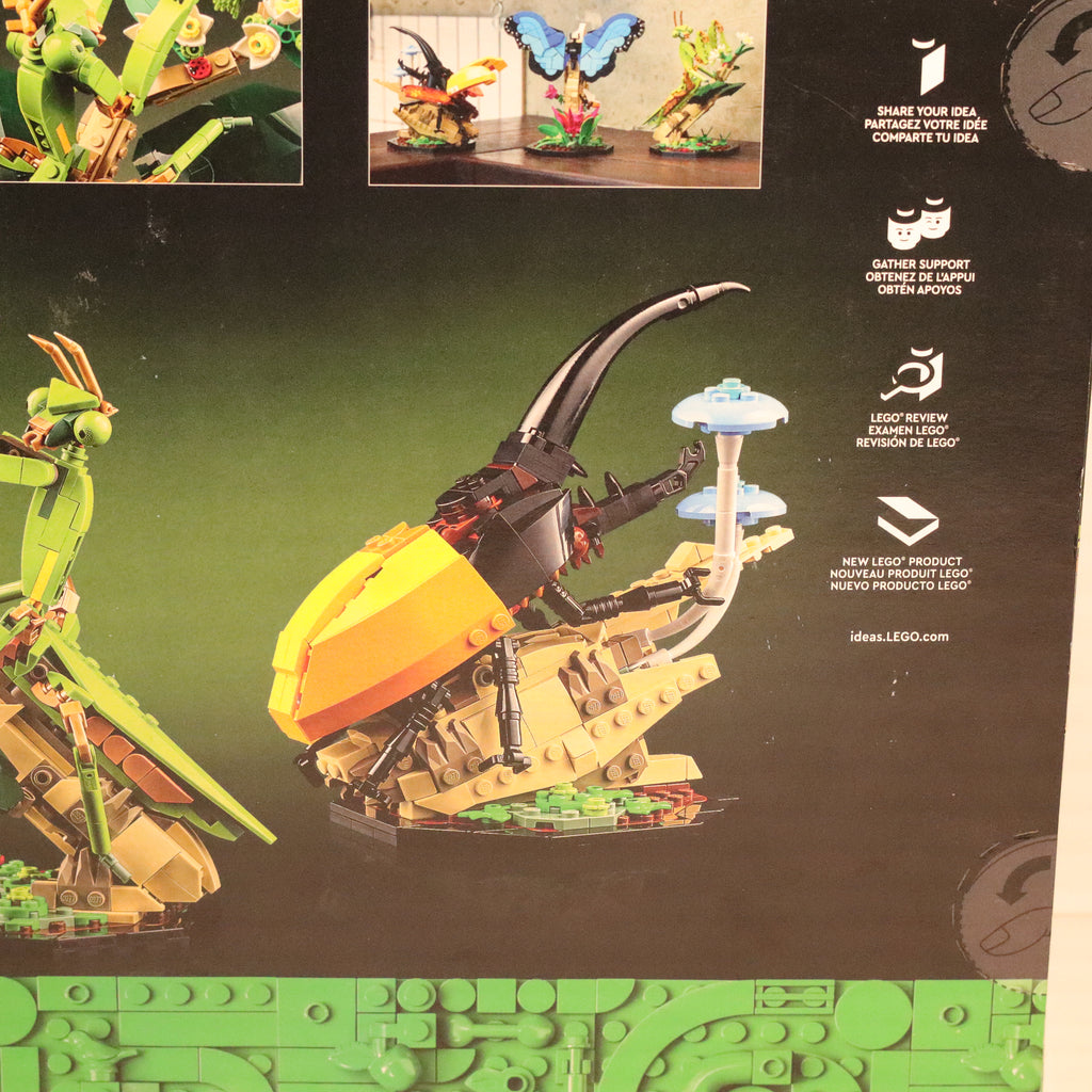 LEGO model of a dragon-like creature on a packaging back with branding and product information.