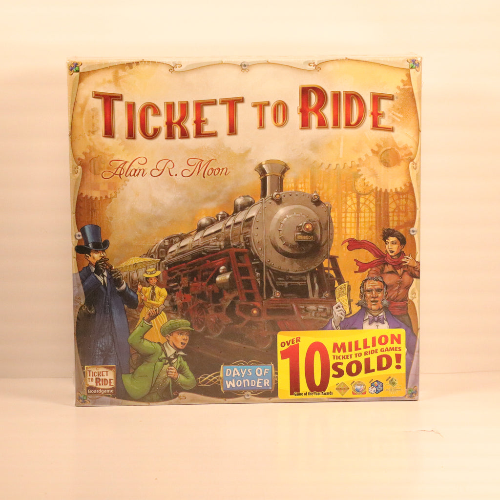 Board game box for 'Ticket to Ride' with steam train and people illustration on a beige background