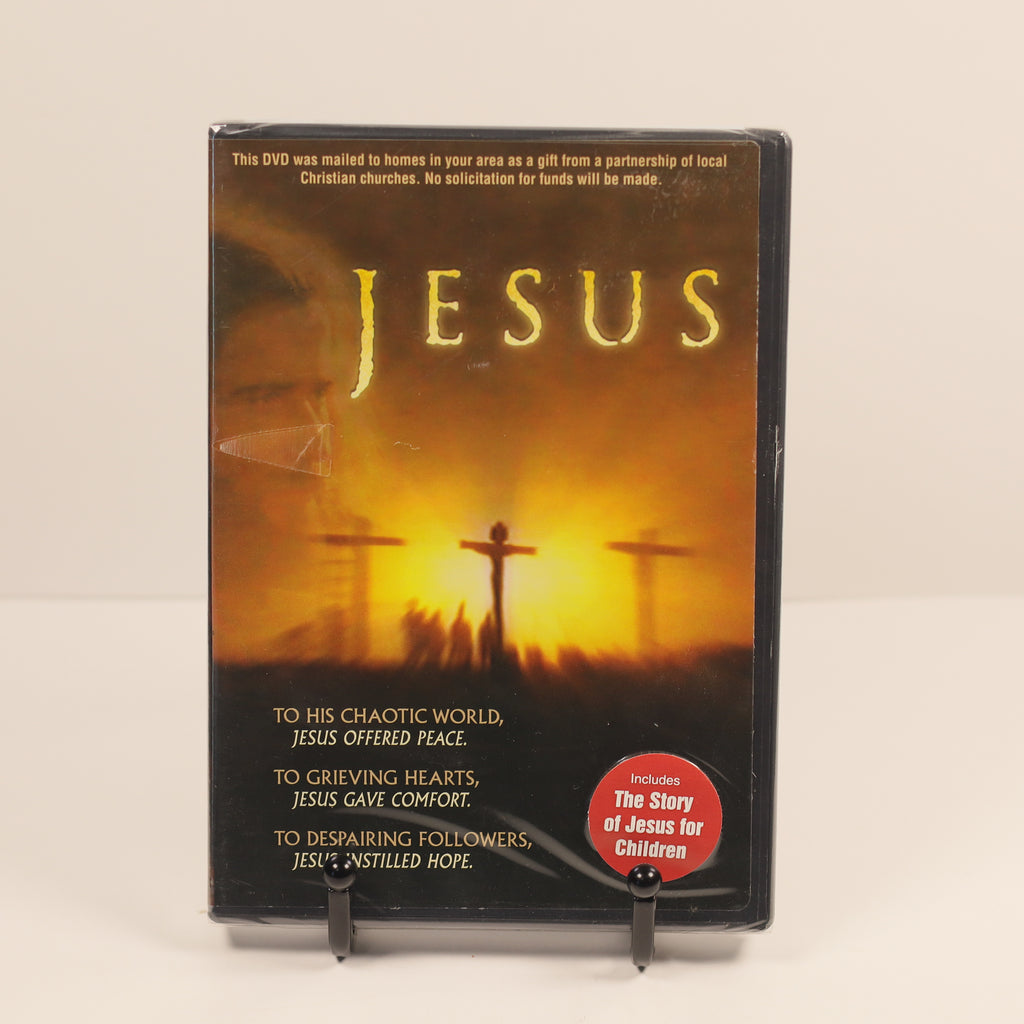 DVD cover with 'Jesus' text and imagery of crosses on a beige background