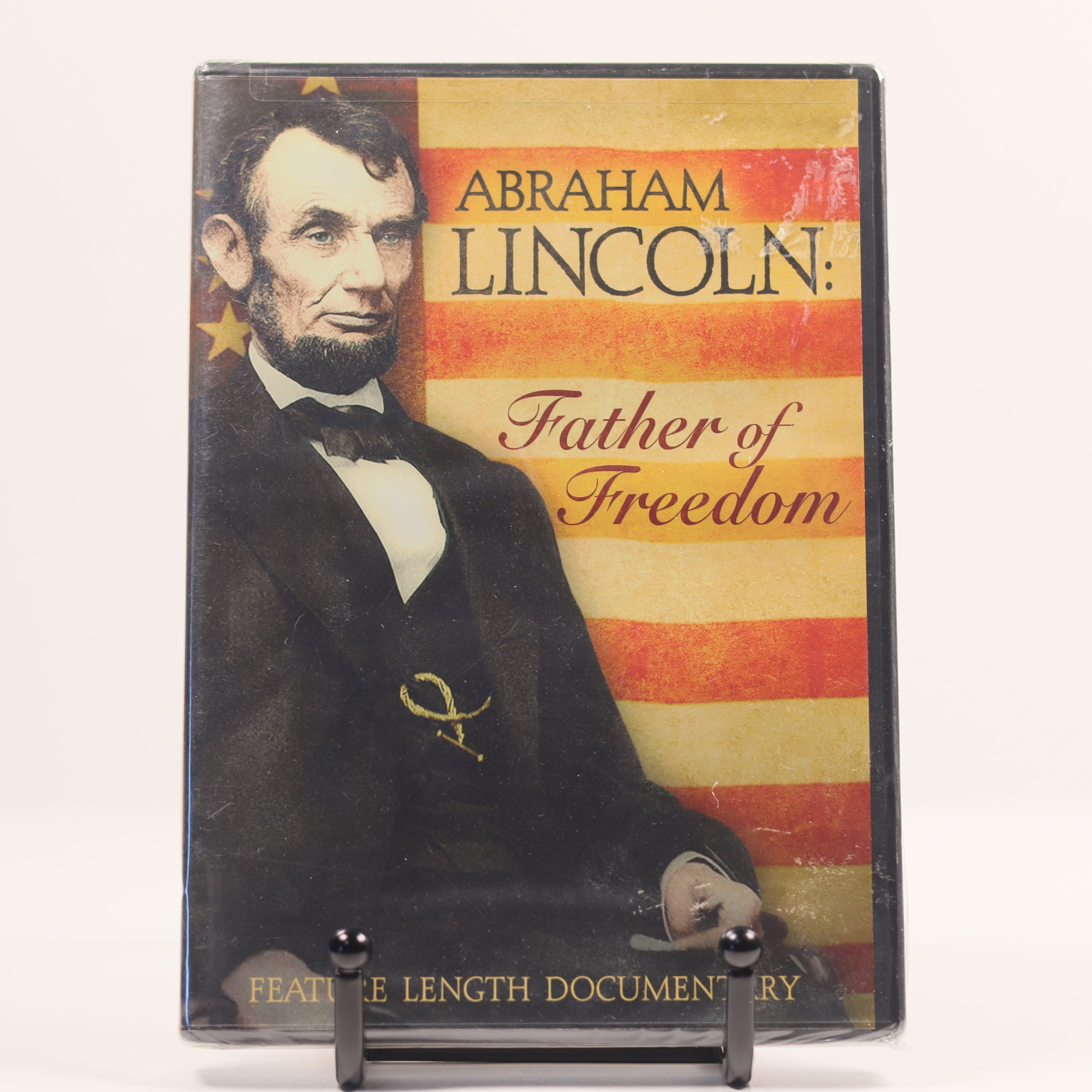 DVD cover featuring Abraham Lincoln with a vintage American flag design