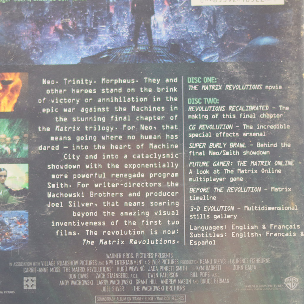 Back cover of 'The Matrix Revolutions' movie with text and images.